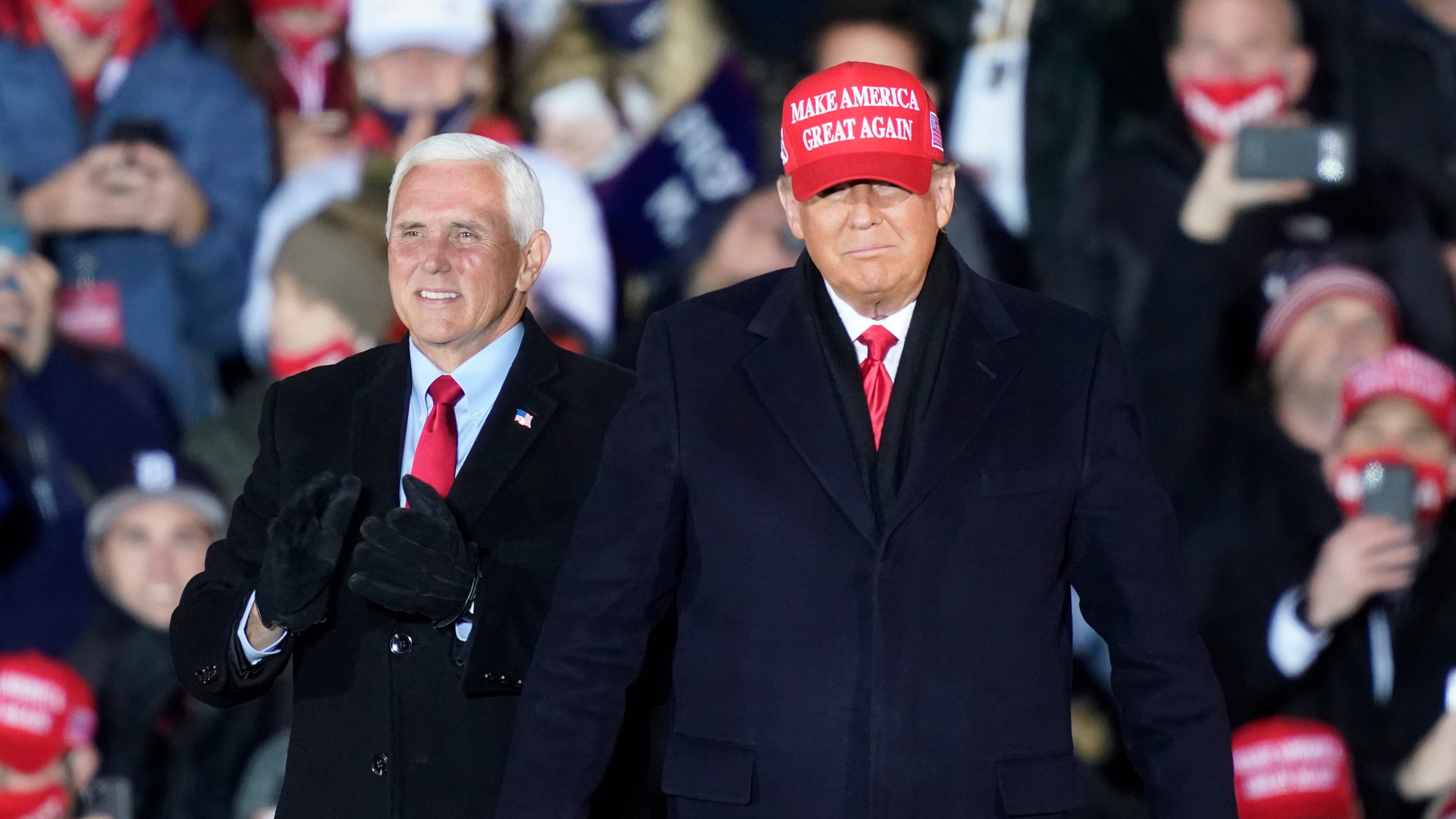 The Latest: Trump predicts he'll 'so easily' win Michigan