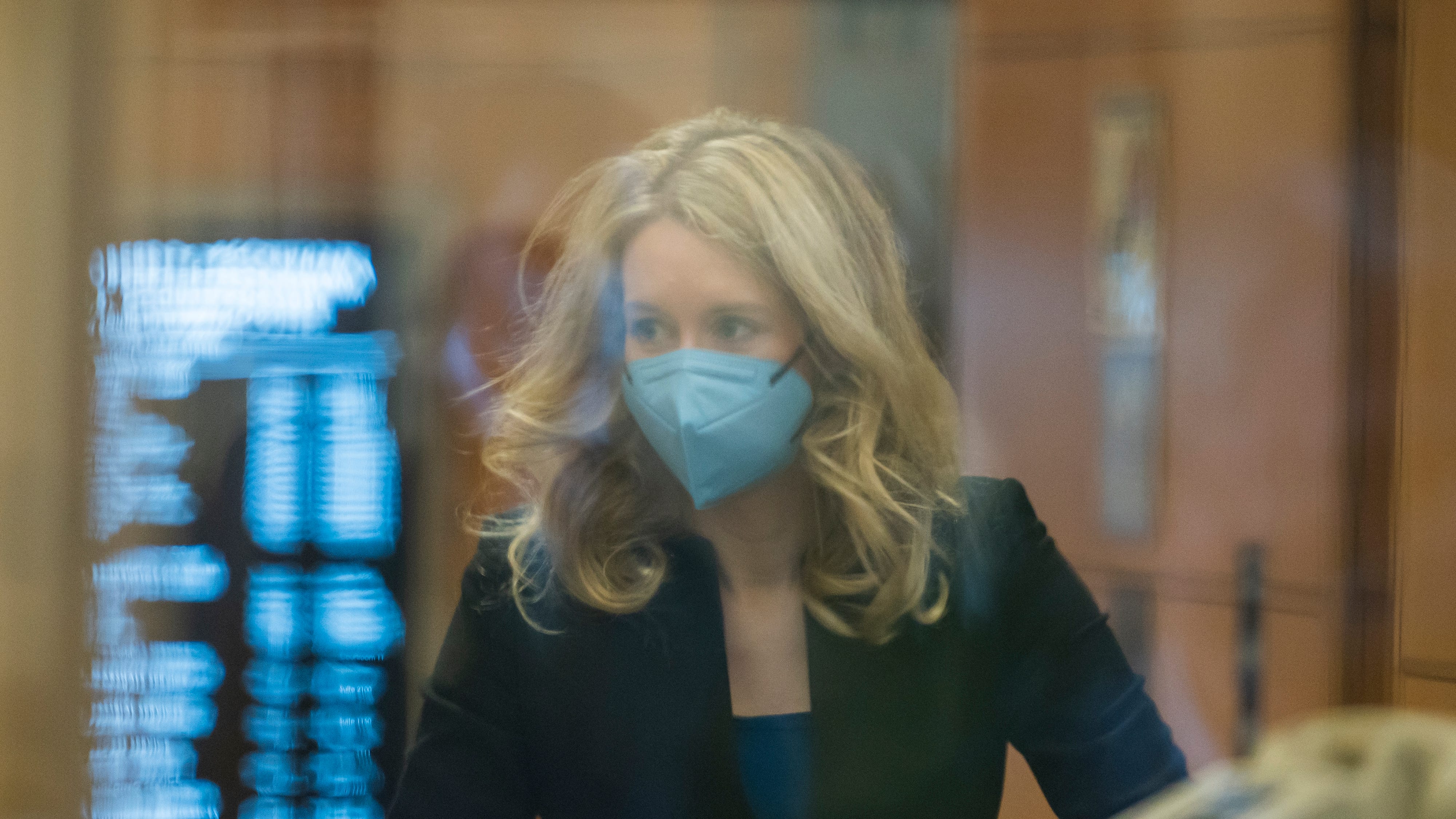 Prosecution casts Elizabeth Holmes as a brazen con artist
