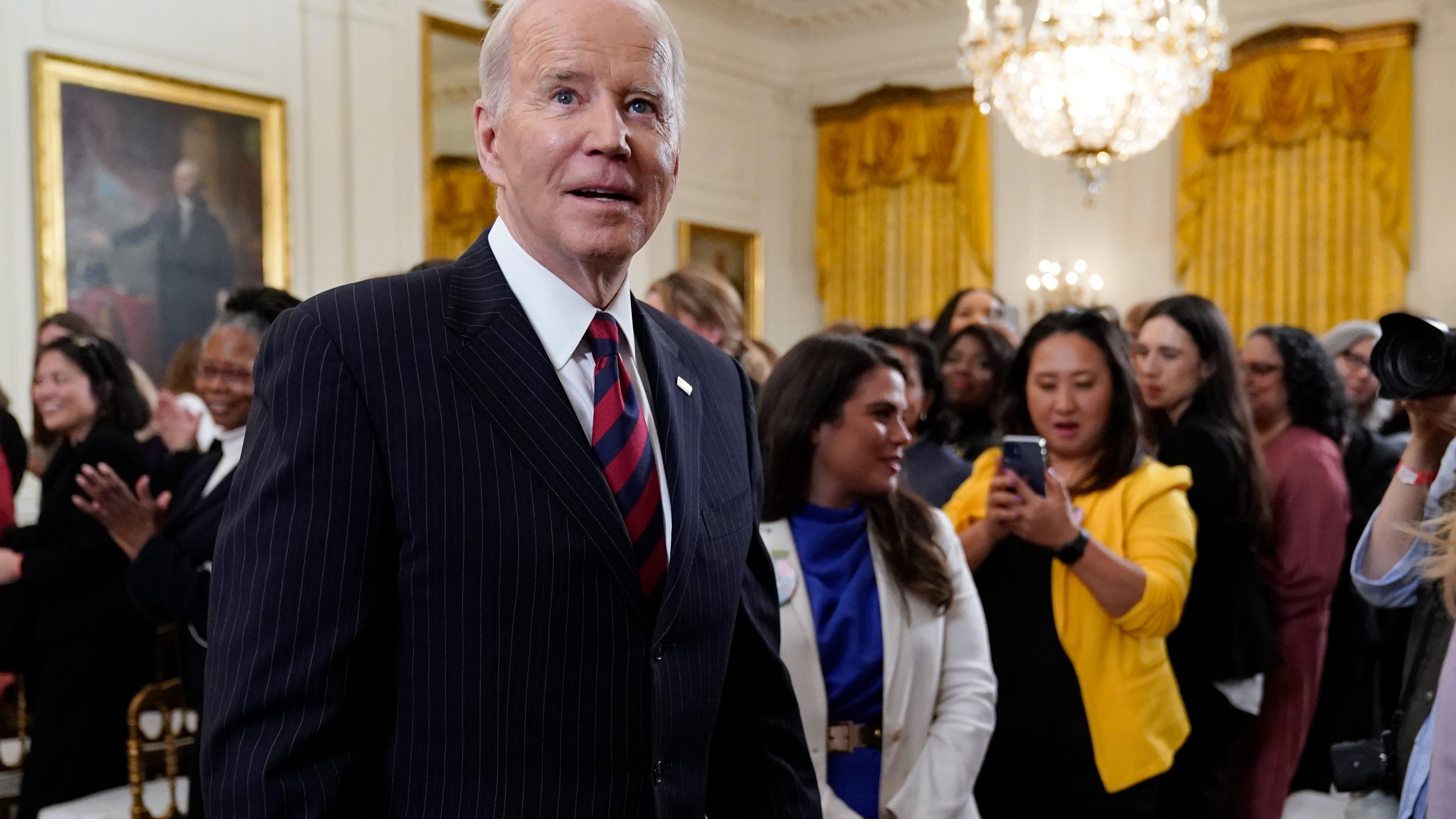 Biden urges private companies to help narrow gender pay gap