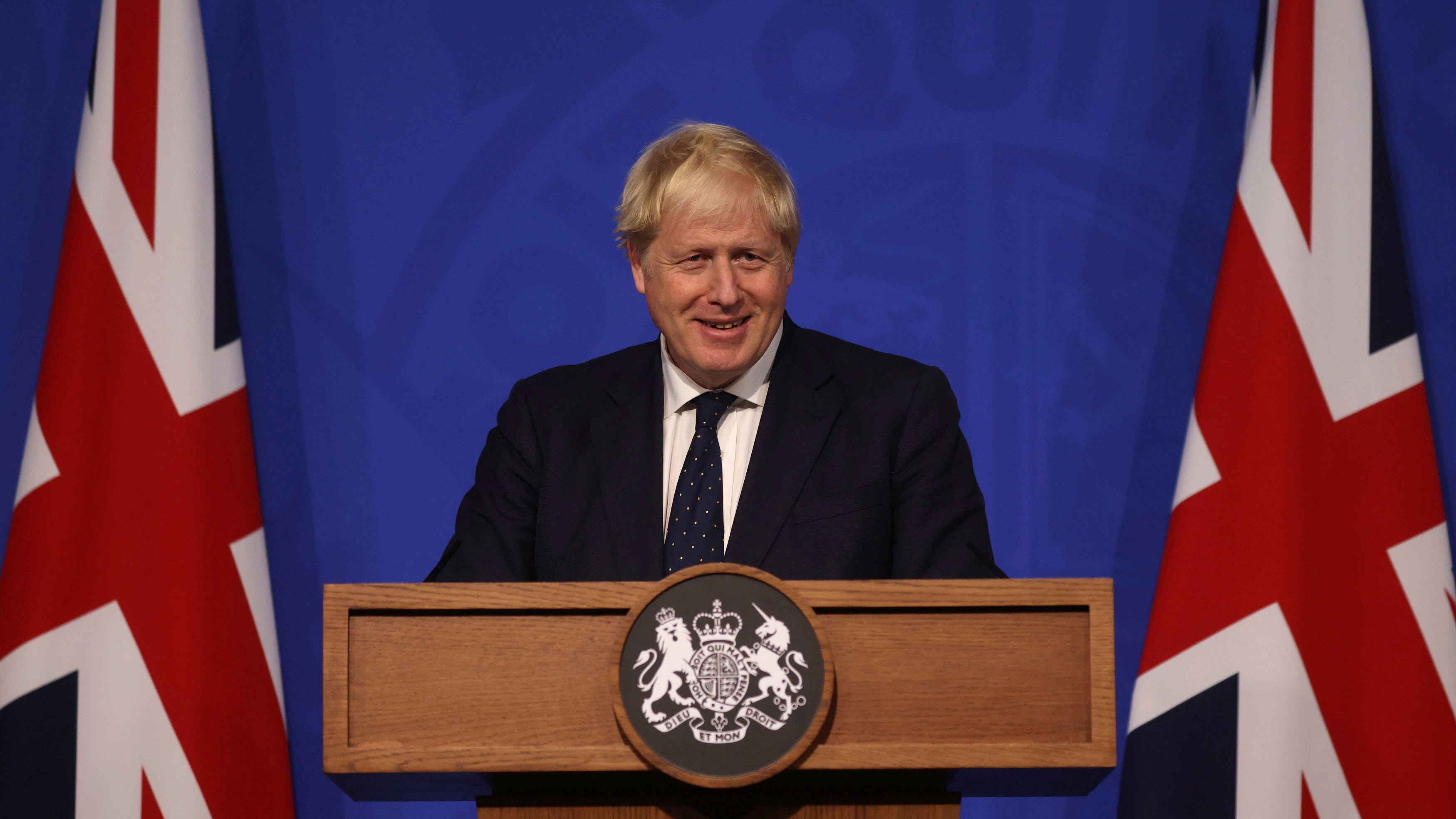 Latest: Britain gives boosters over 50, with health issues