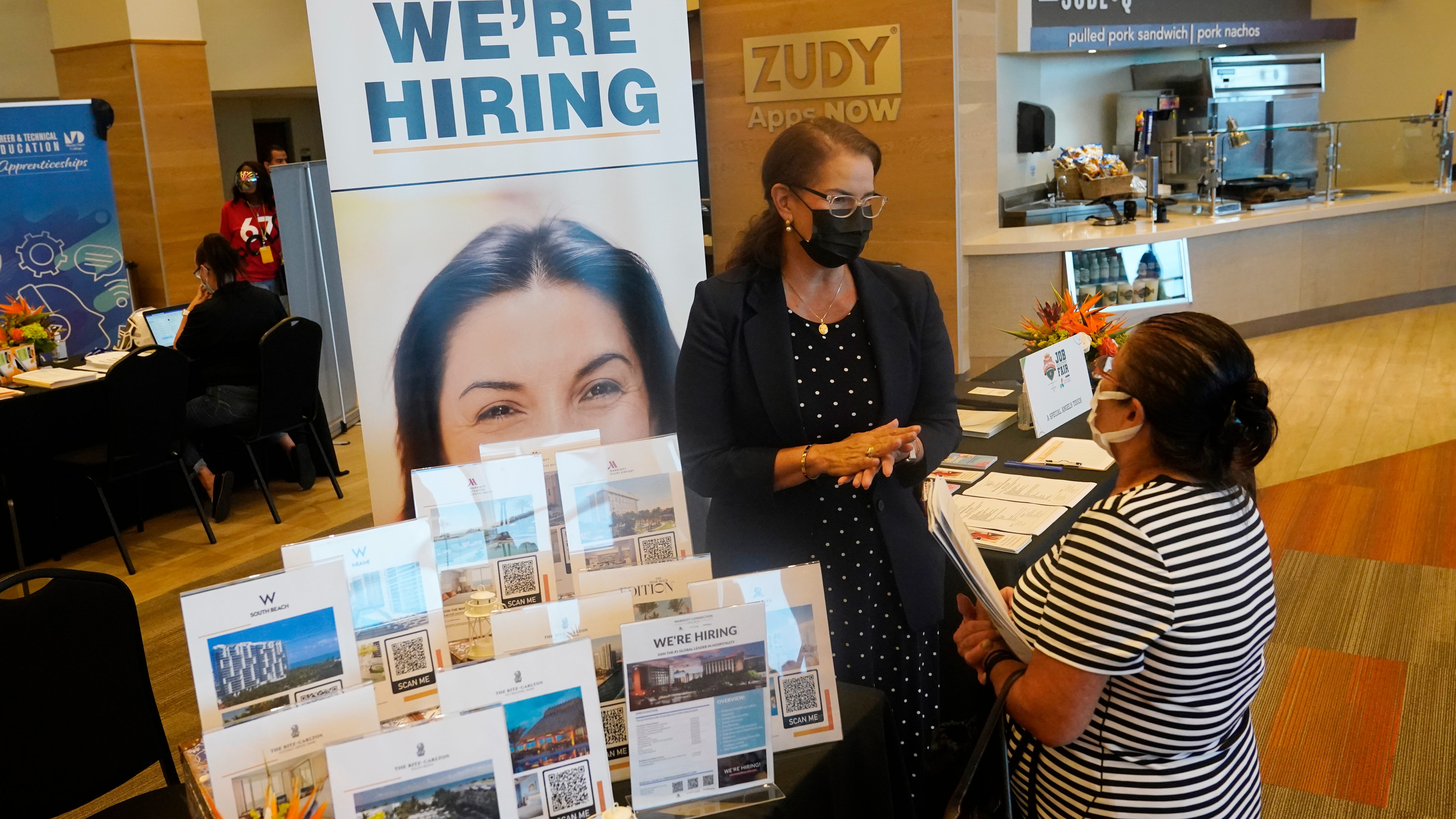 US unemployment sinks to 3.9% as many more people find jobs
