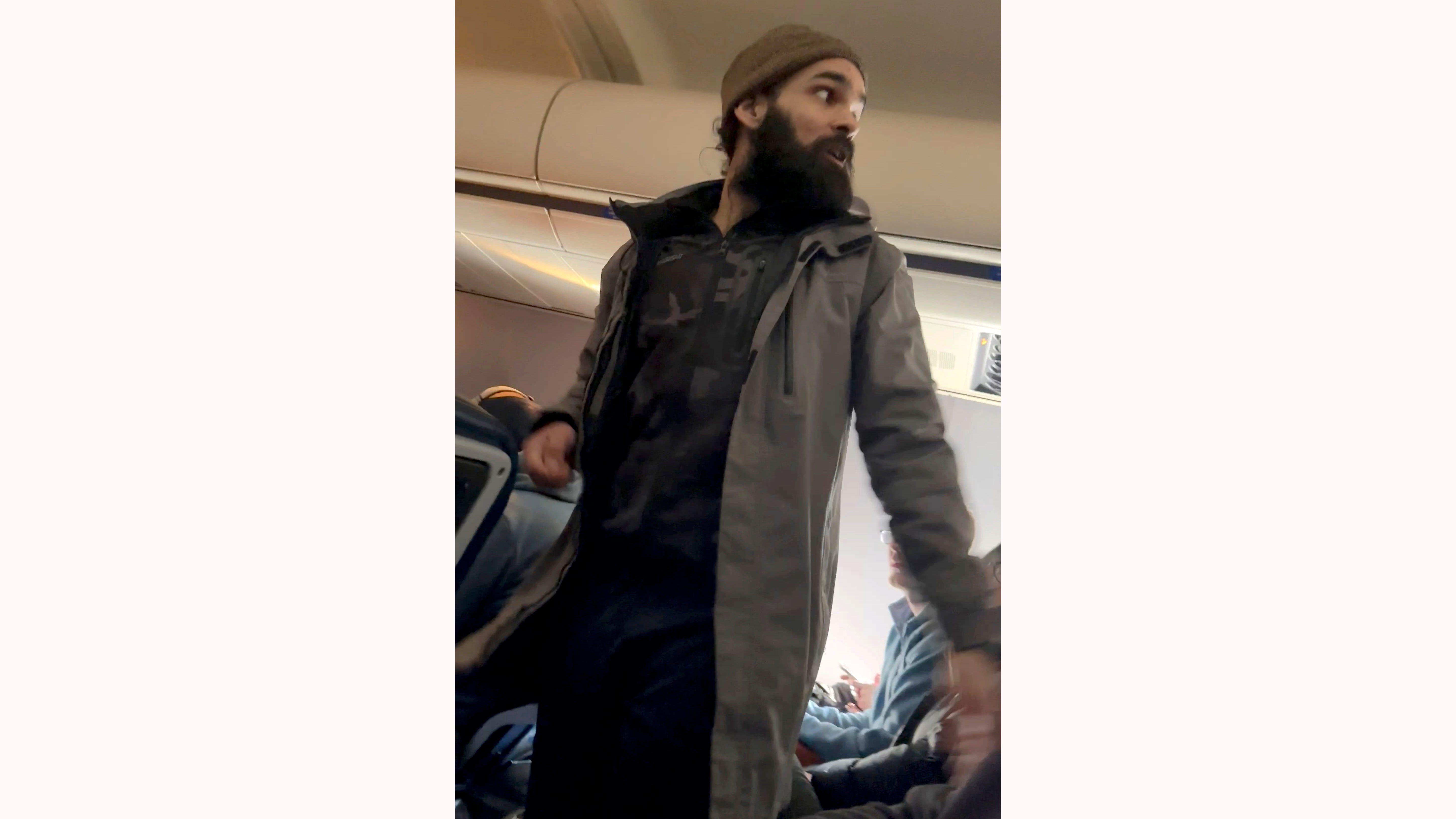 How passengers teamed up to restrain man on chaotic flight