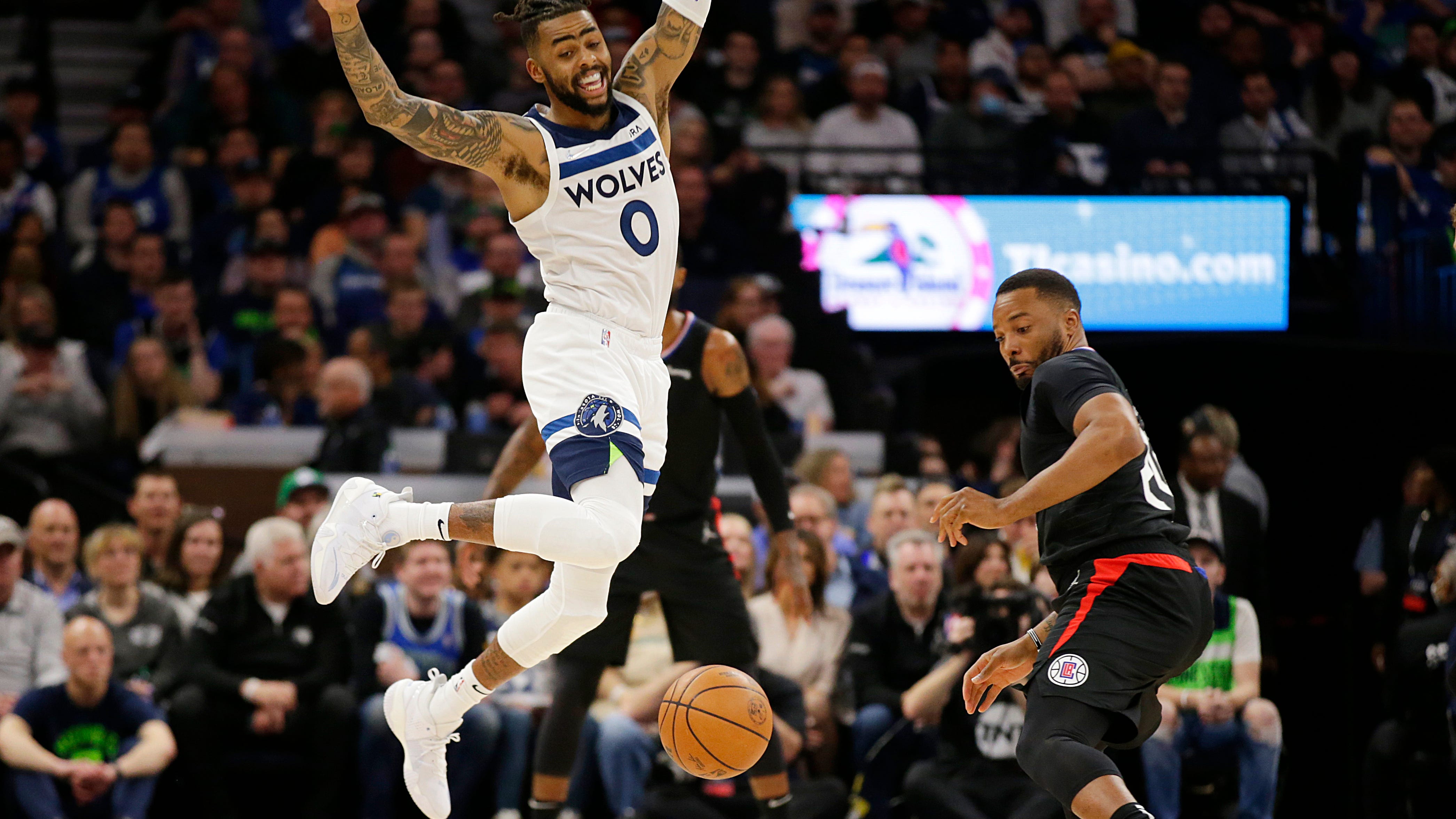 Edwards, Russell carry Wolves past Clippers in play-in game