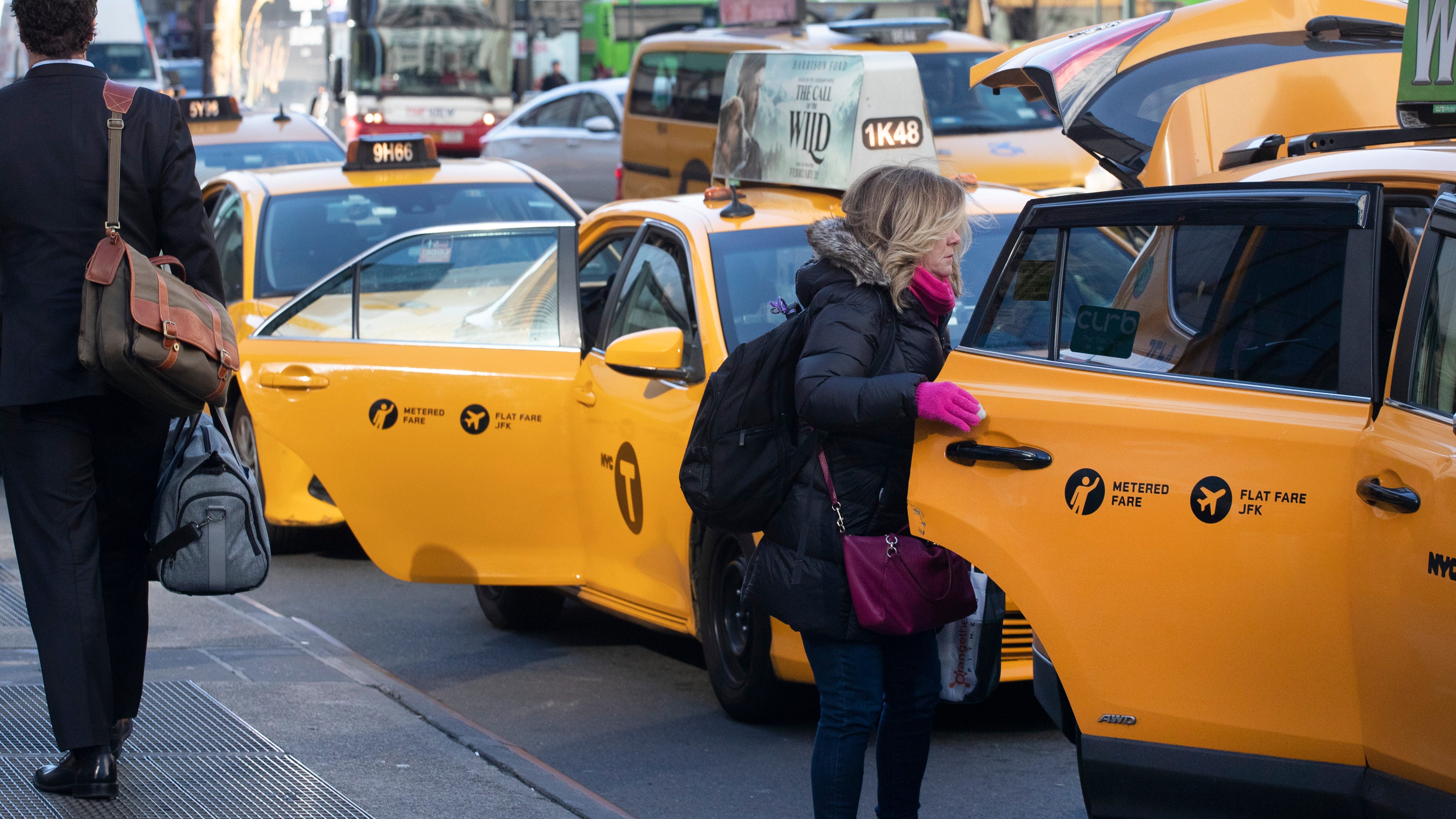 After years of rivalry, Uber puts NYC taxi cabs on its app