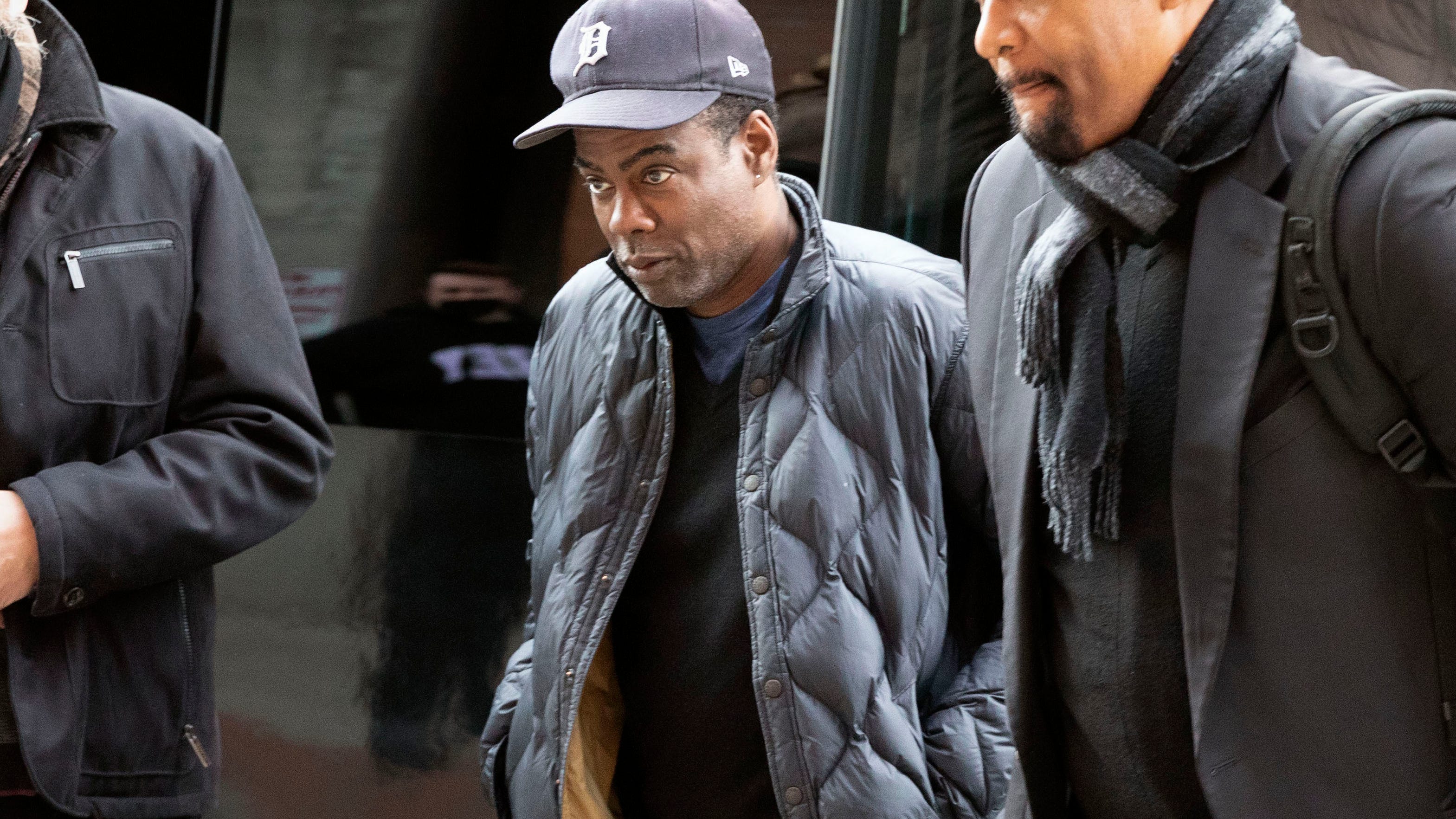 Chris Rock takes to comedy mic, still processing Oscars slap