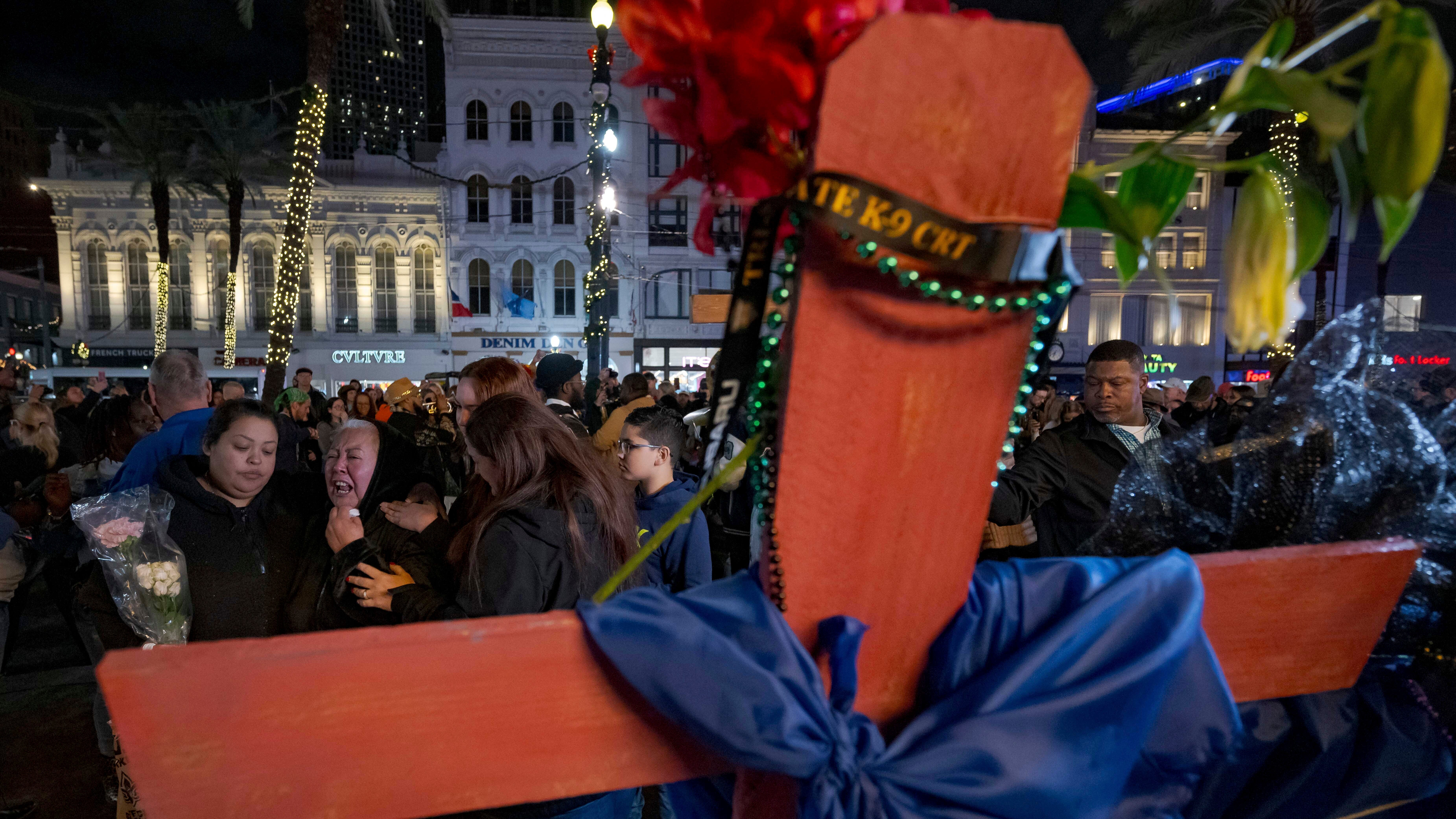 New Orleans mourns victims of truck attack with tearful vigil and celebration of life