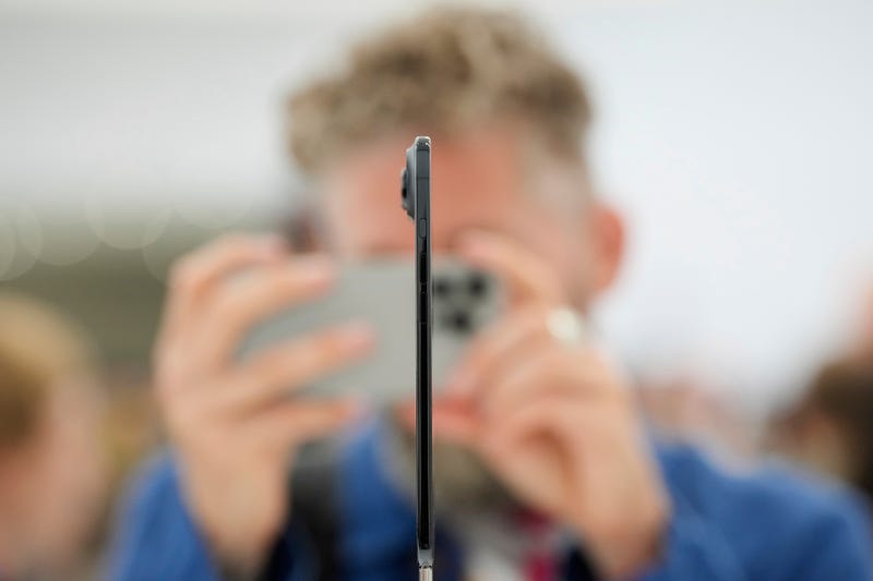 APTOPIX Apple New iPhones