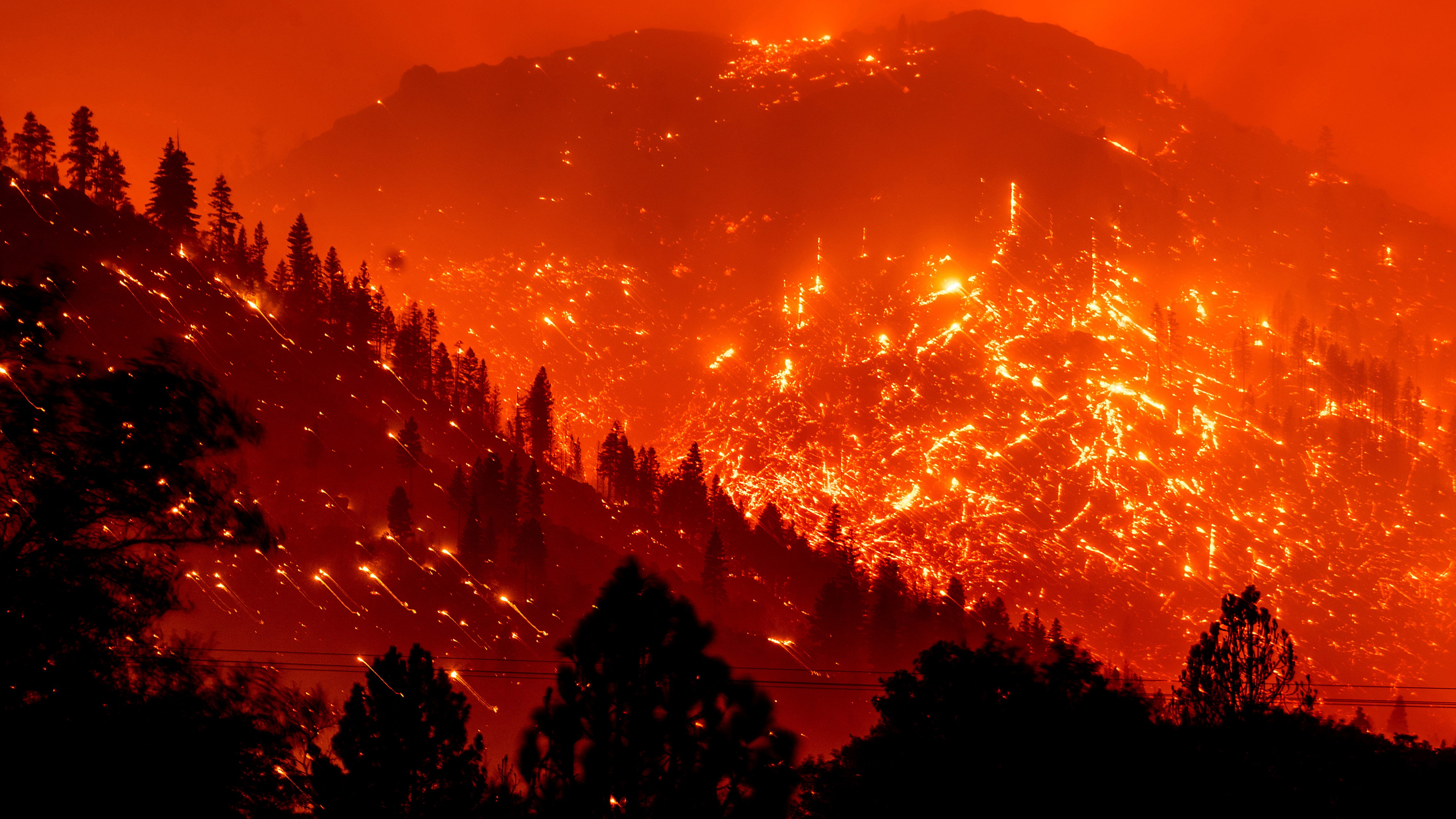 Devastating wildfires advancing through Northern California