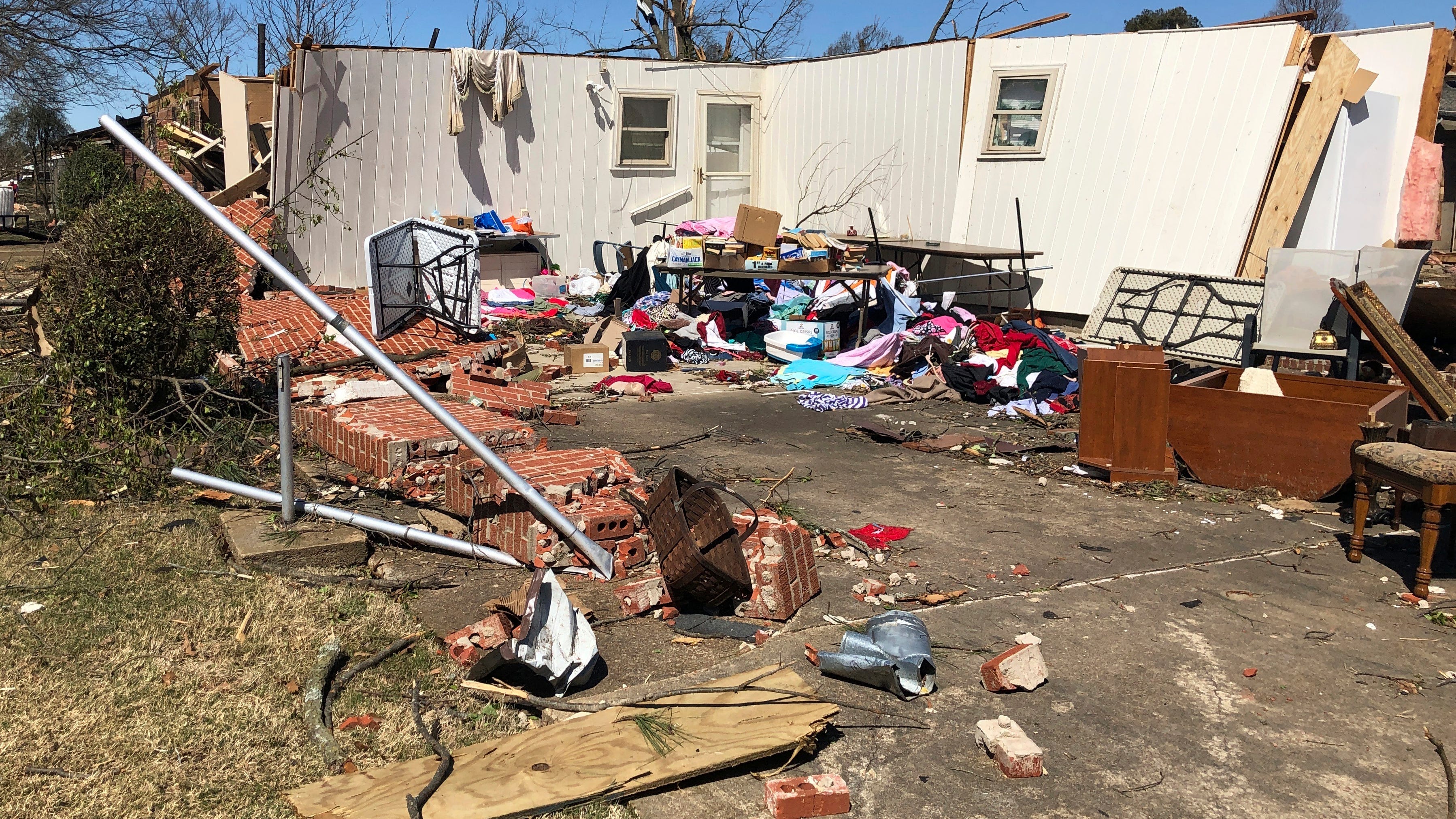 Tornado survivors recount flying debris, destroyed buildings