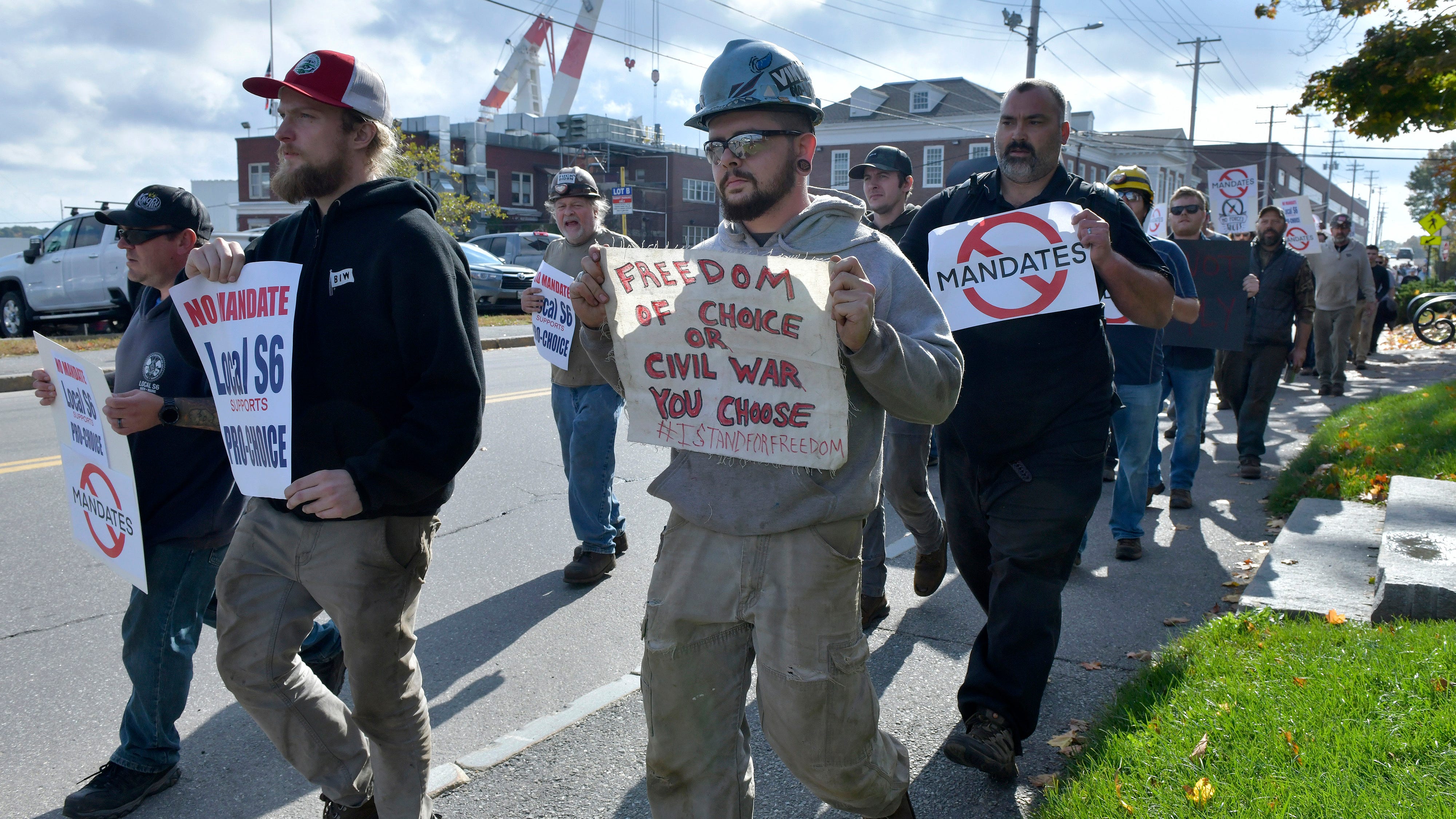 Vaccine mandates create conflict with defiant workers