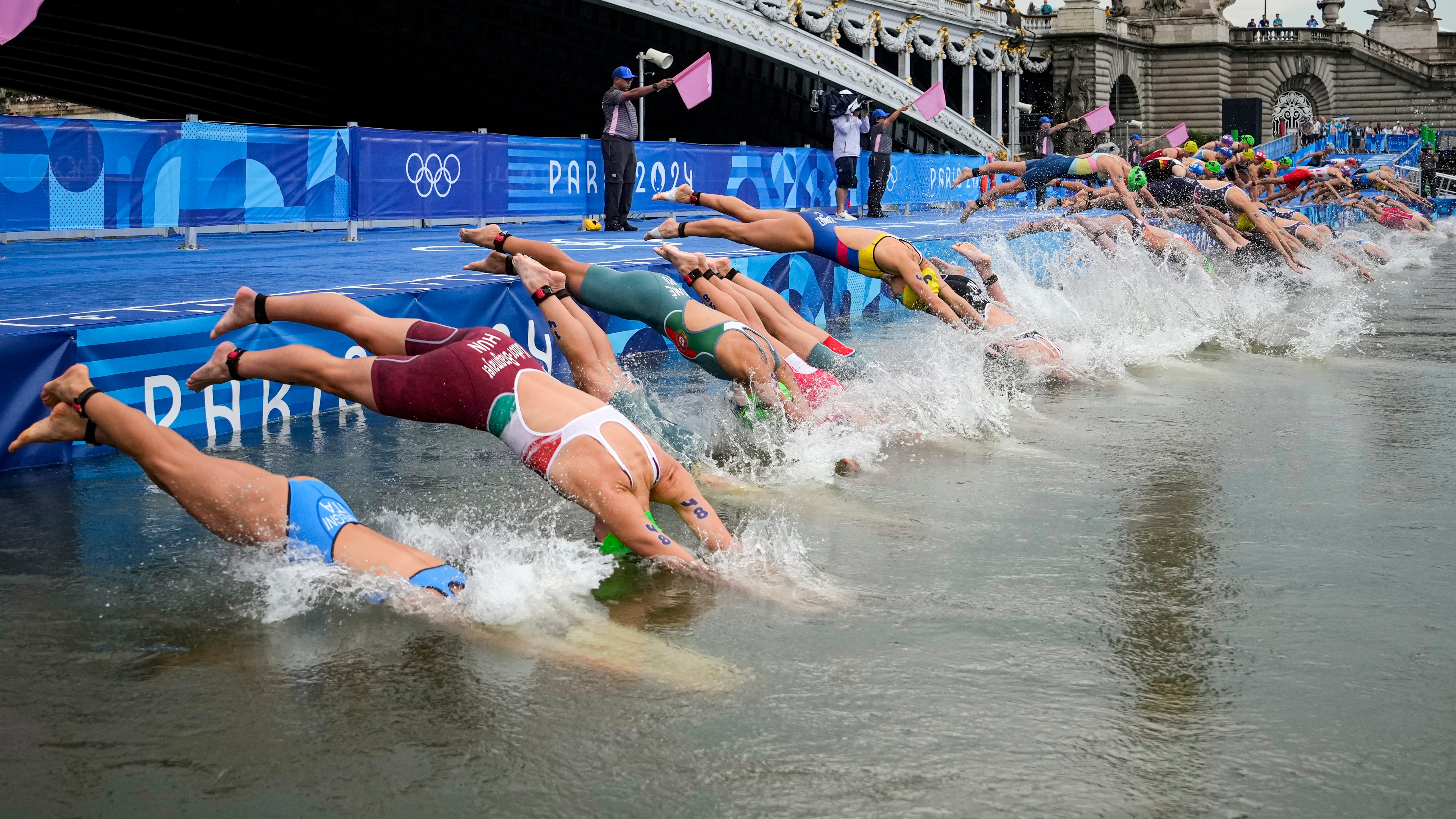 Olympic triathletes swim in Seine River after days of concerns about water quality