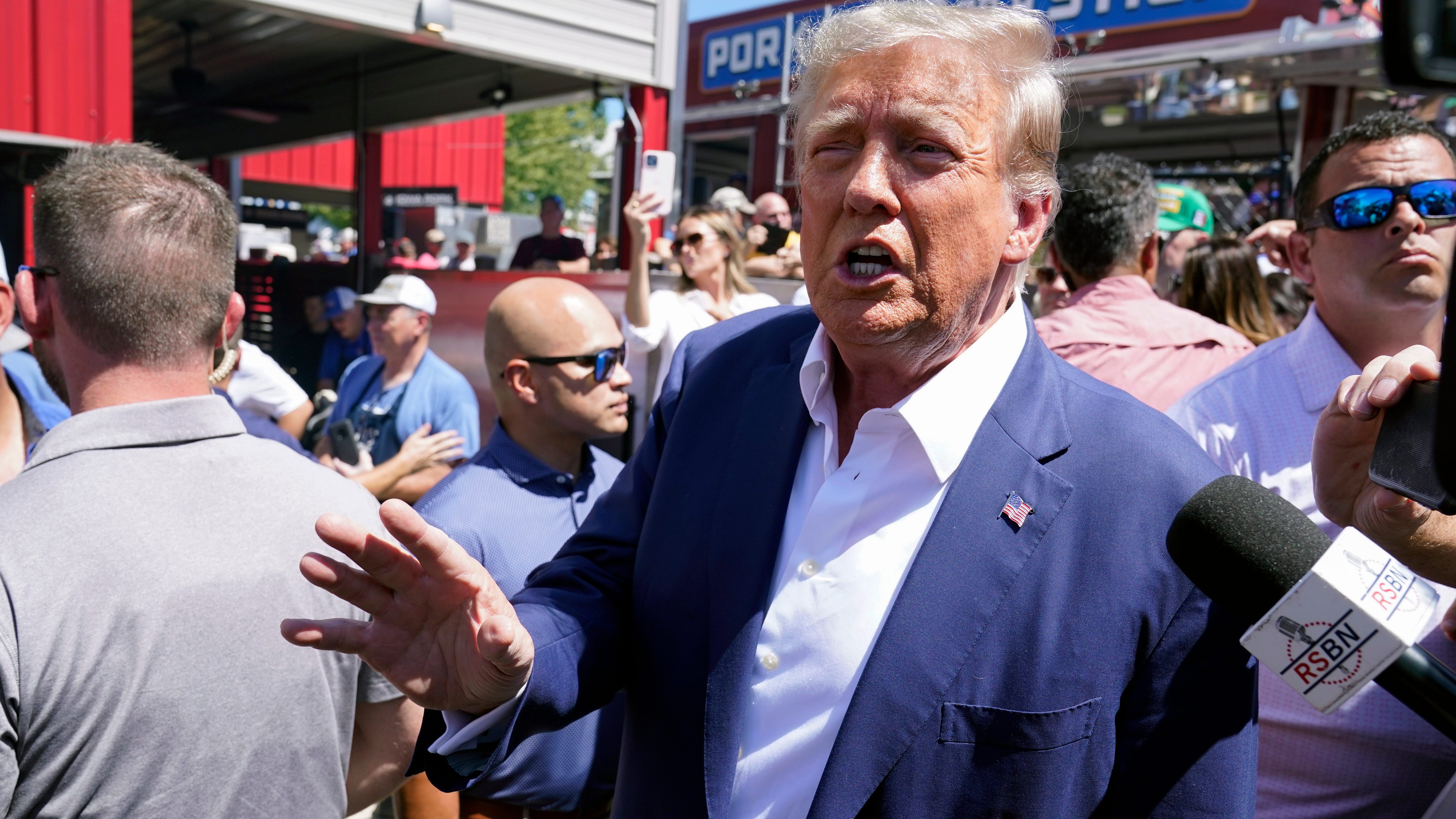Trump's Iowa state fair spectacle clouds DeSantis as former president is joined by Florida officials