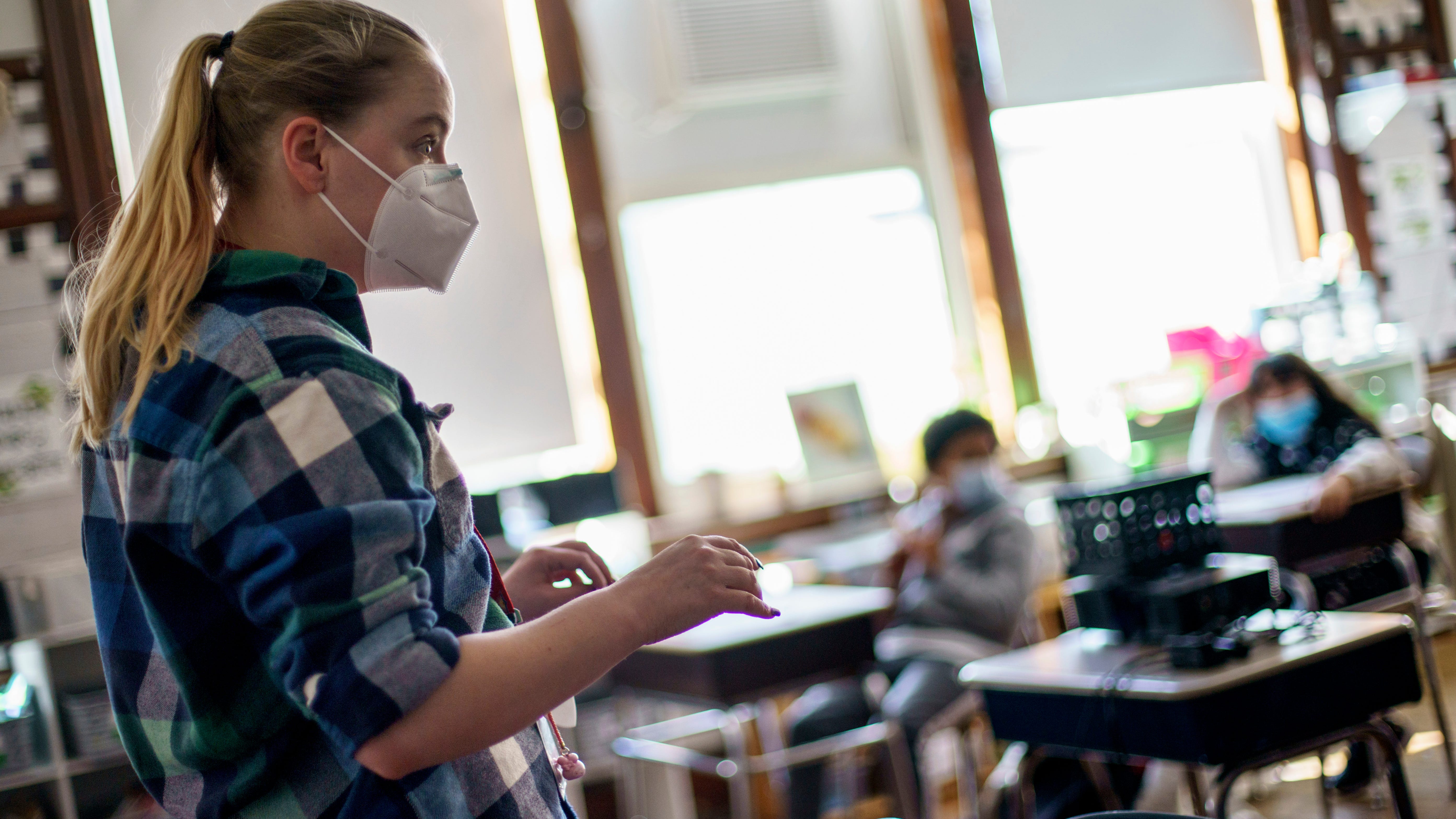 As state mask rules end, school leaders are in the middle