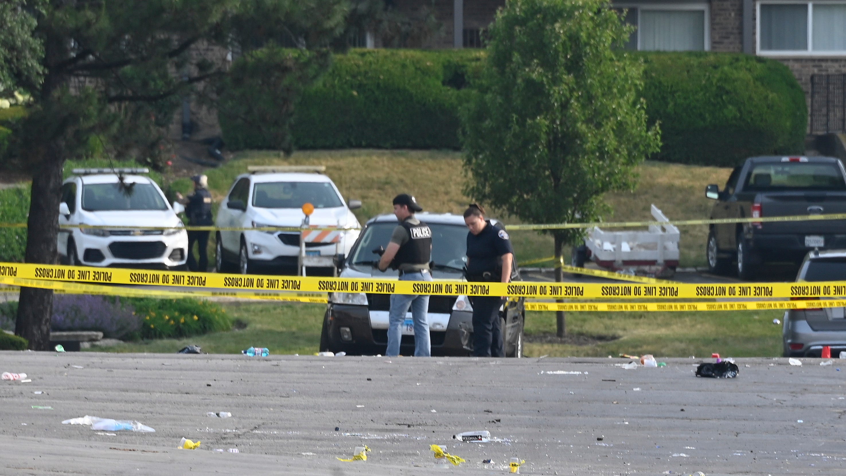Parking lot party shooting leaves 1 dead and 19 people hurt in suburban Chicago