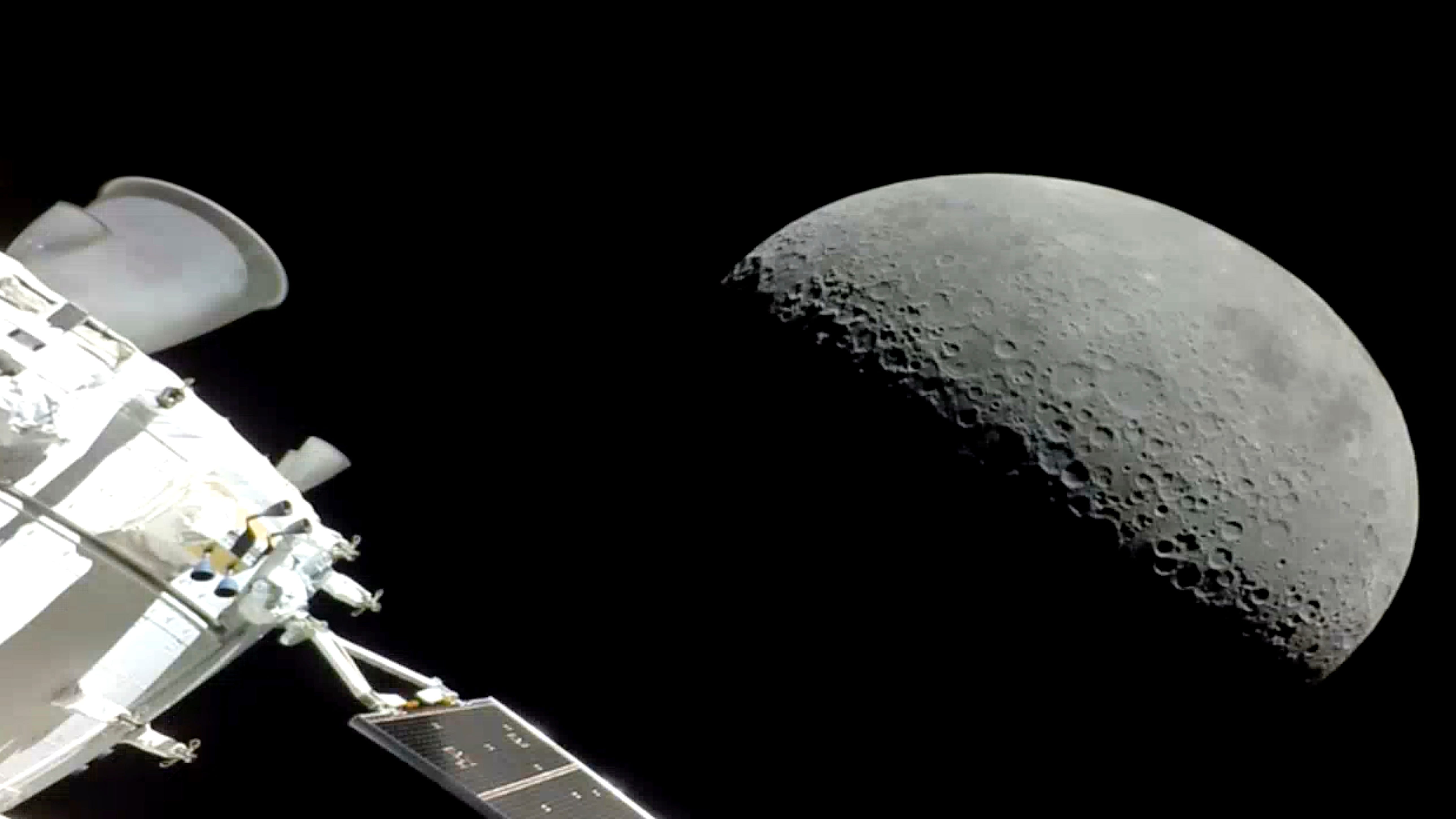 NASA capsule flies over Apollo landing sites, heads home