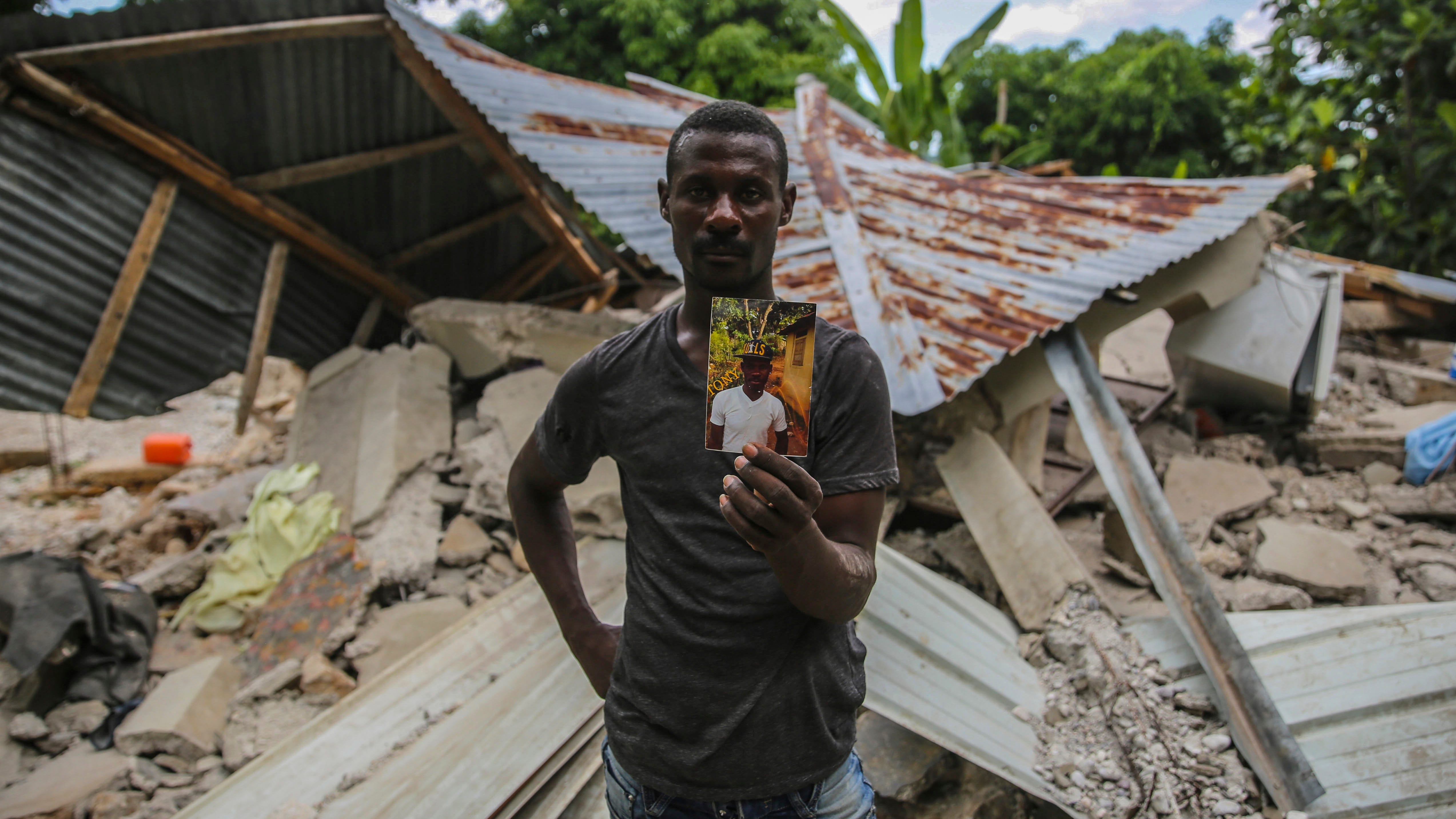 Rescuers racing in Haiti as storm threatens to follow quake
