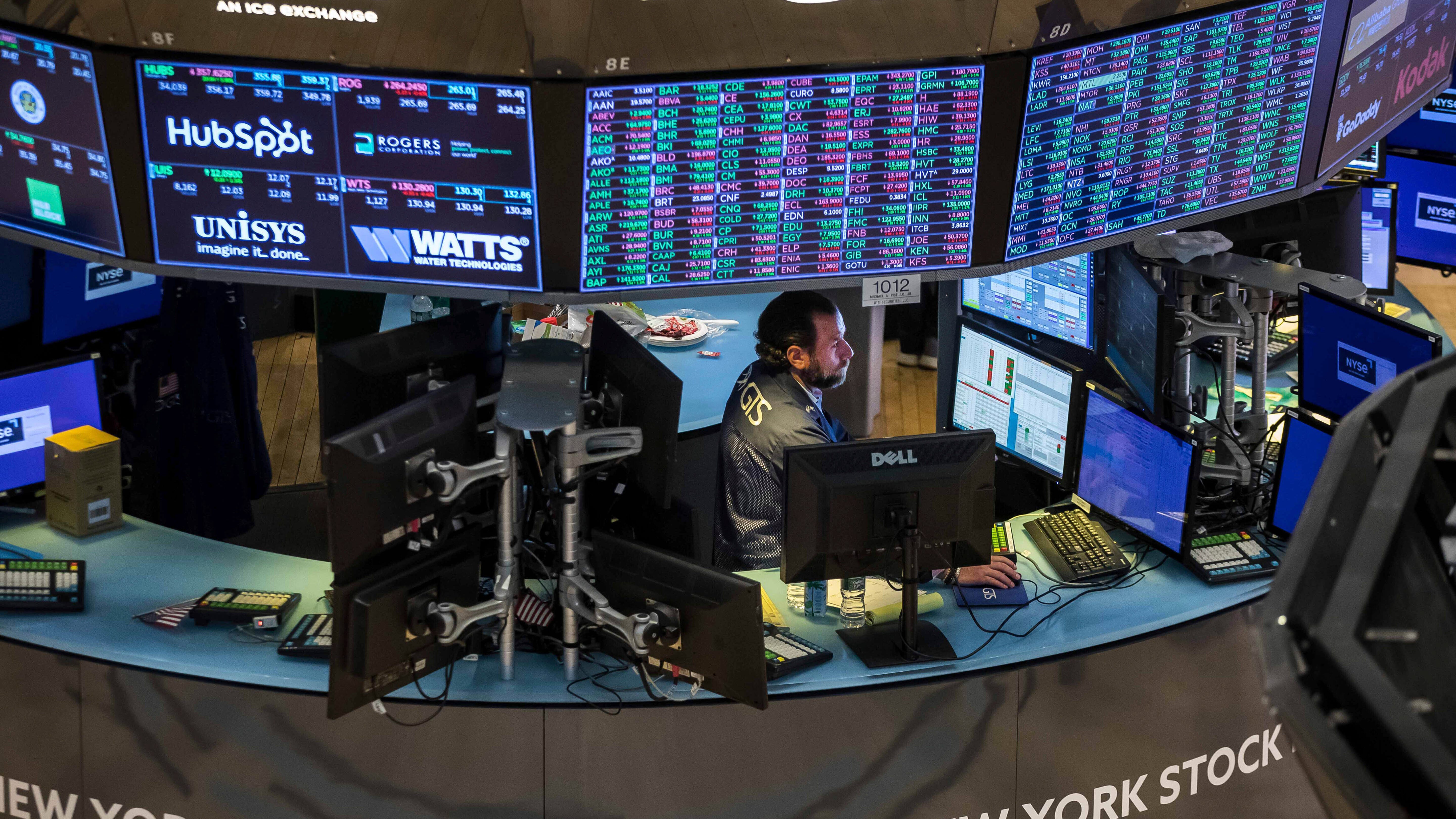 Stocks slide as strong economic data raises rate worries
