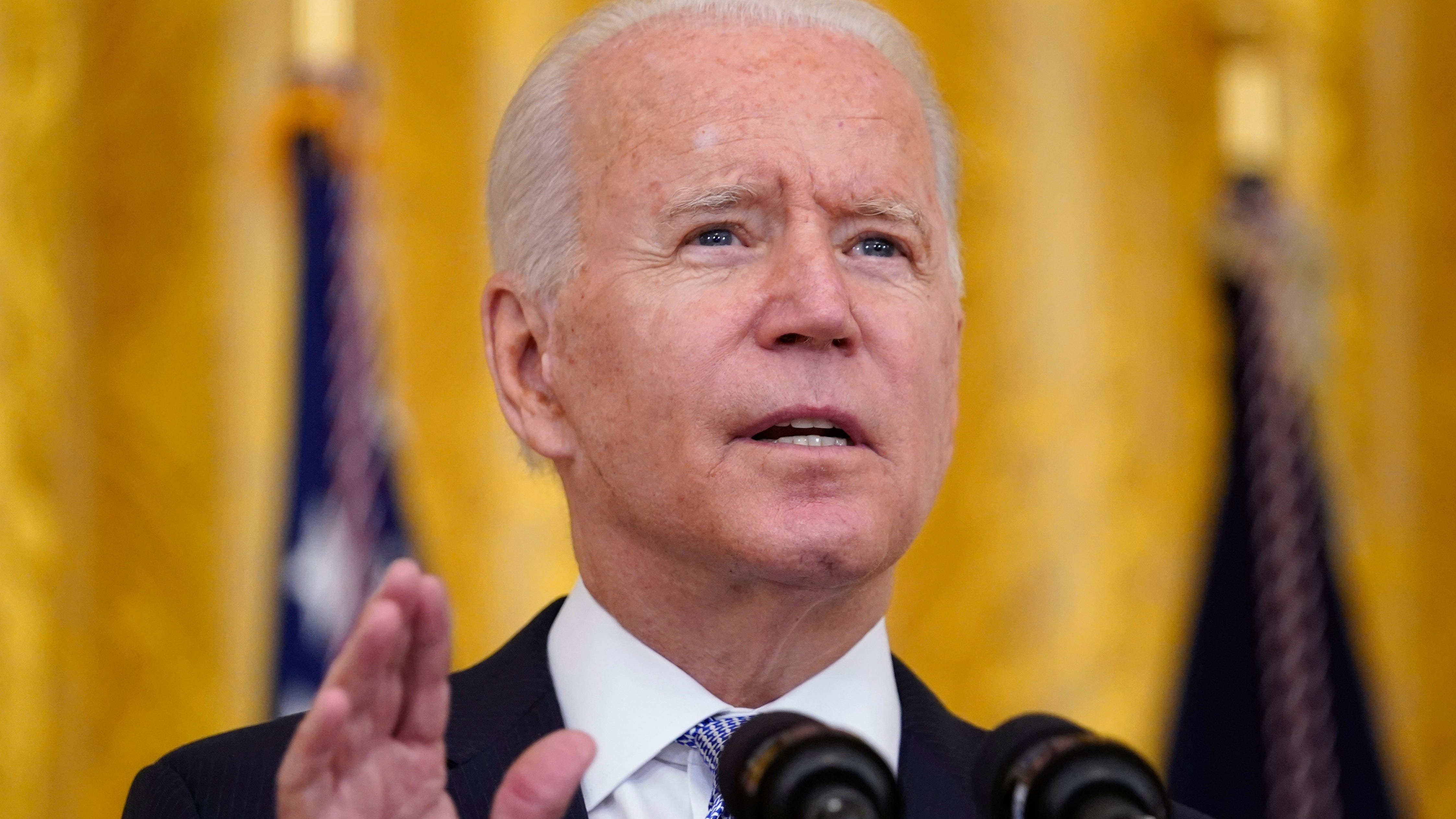 Biden orders tough new vaccination rules for federal workers