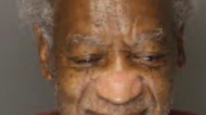 Bill Cosby, now 83, grins in newly released prison mug shot