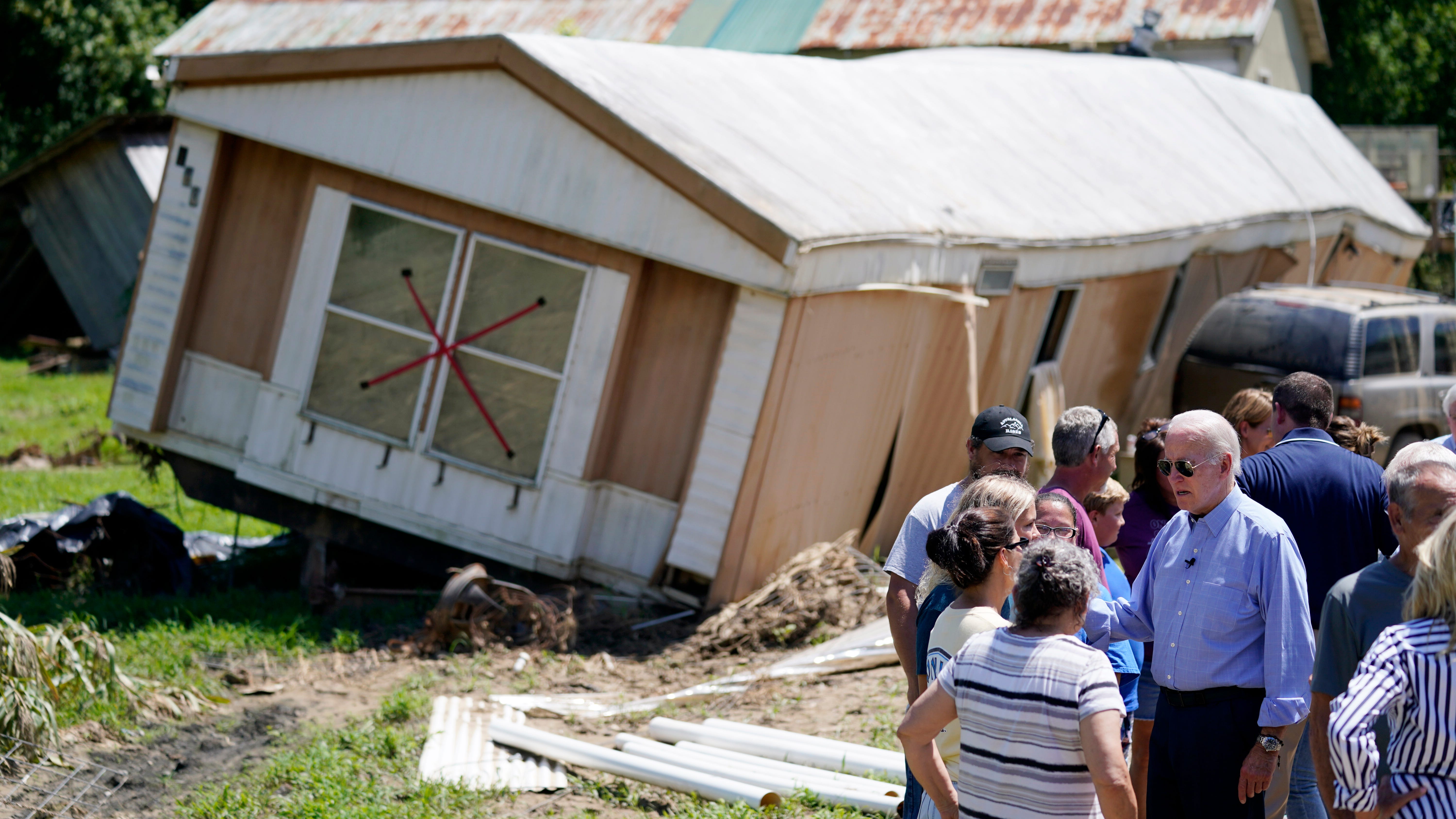 Biden surveys flood damage in Kentucky, pledges more US help