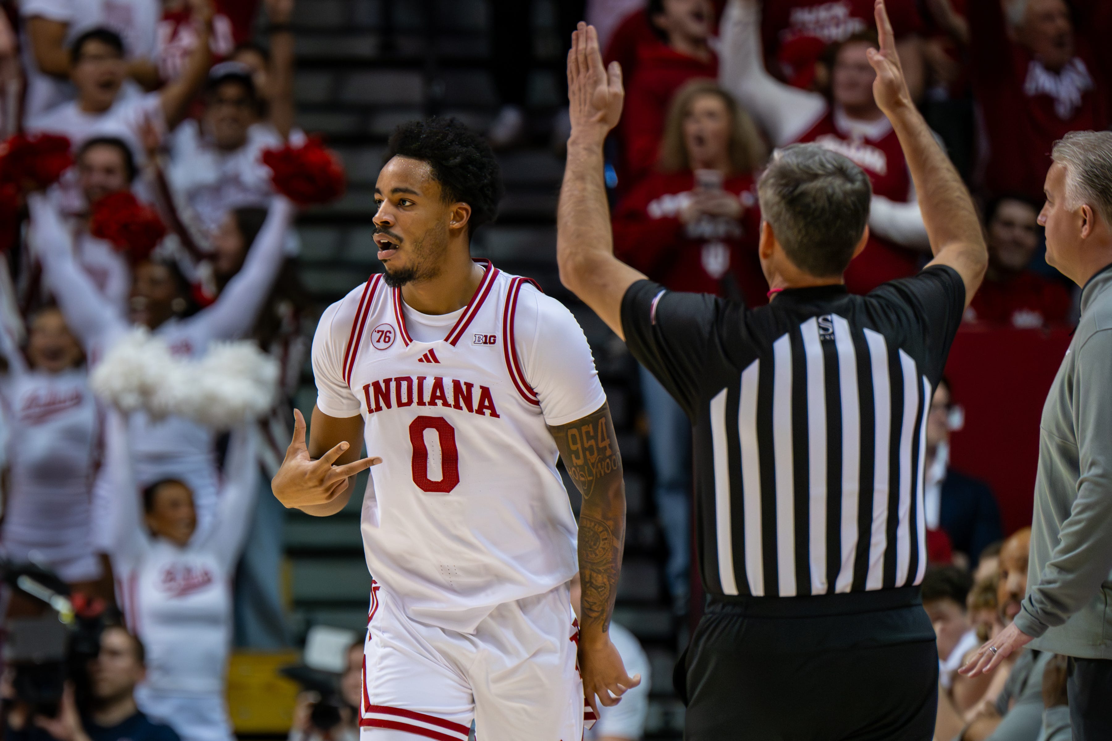 Indiana adds to celebration as football champs take victory lap and basketball team beats Purdue