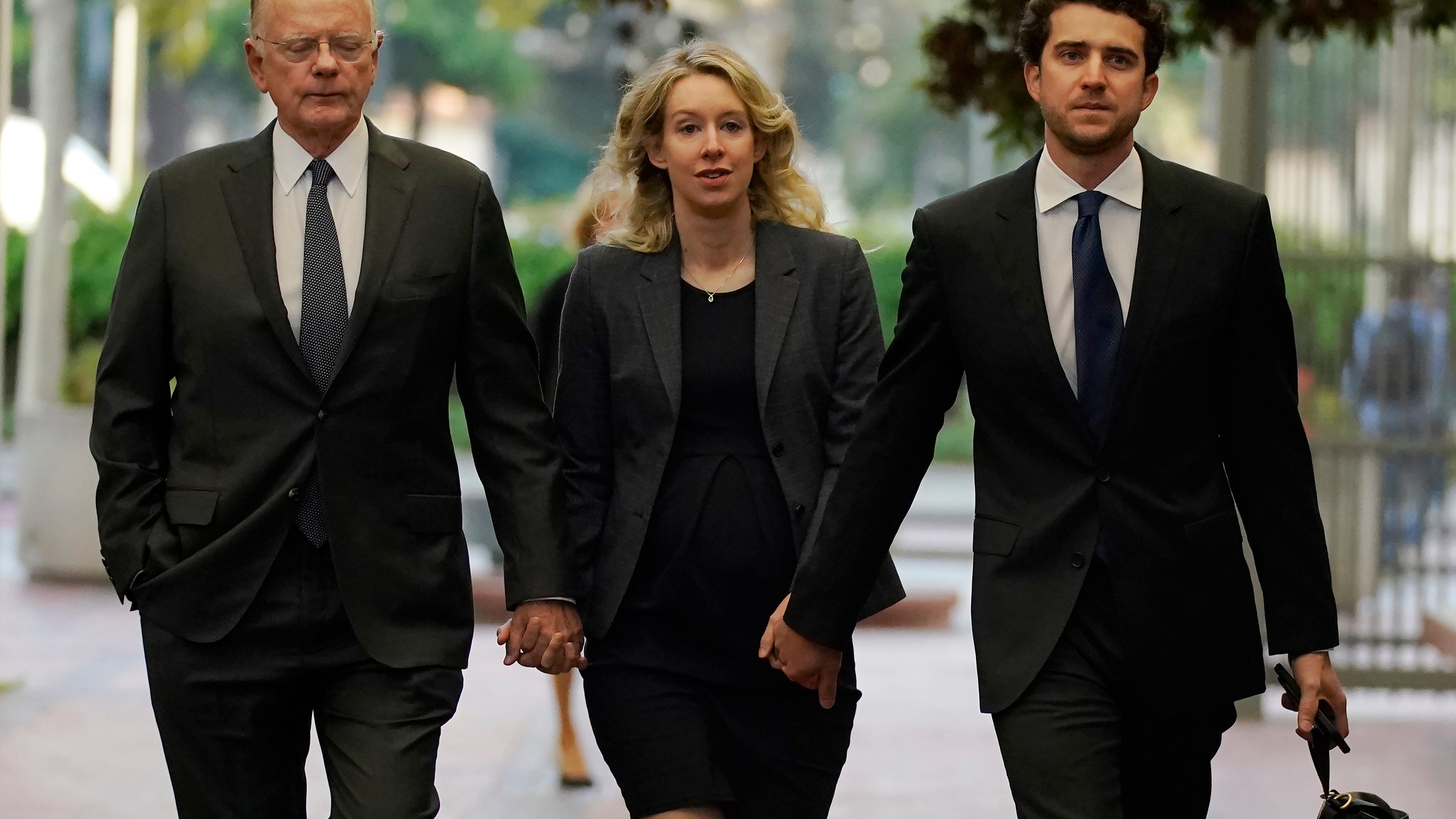 As Elizabeth Holmes heads to prison for fraud, many puzzle over her motives