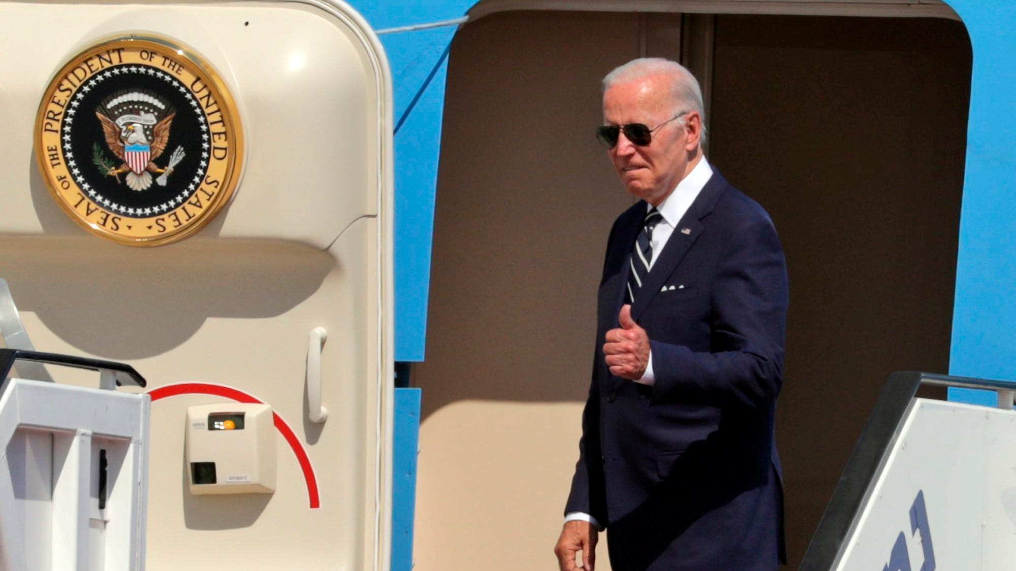 The Latest: Honor guard for Biden on Saudi arrival, no king