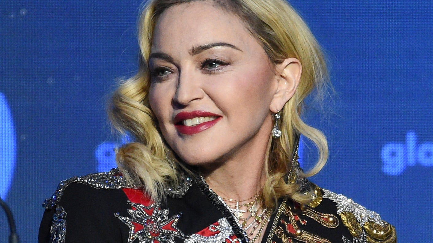 Madonna says she's 'on the road to recovery' following ICU stay, postpones North American tour dates