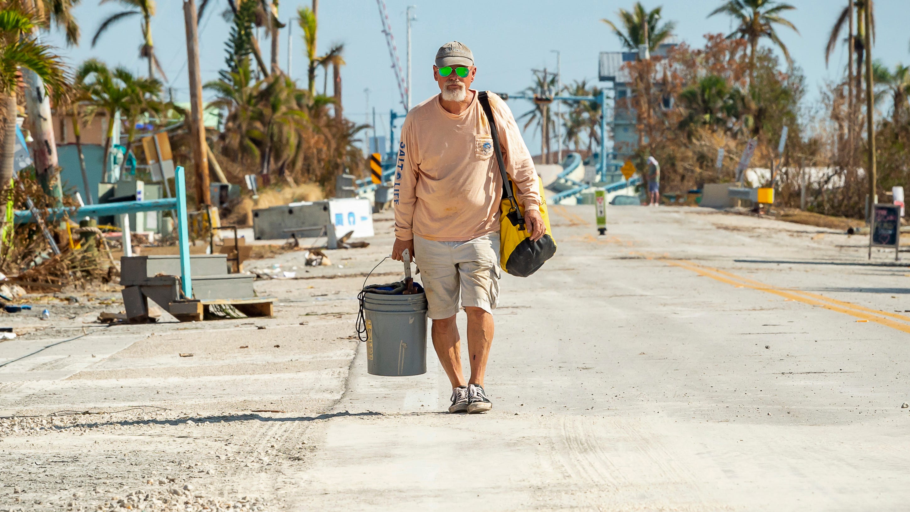 Floridians endure slow wait for power knocked out by Ian