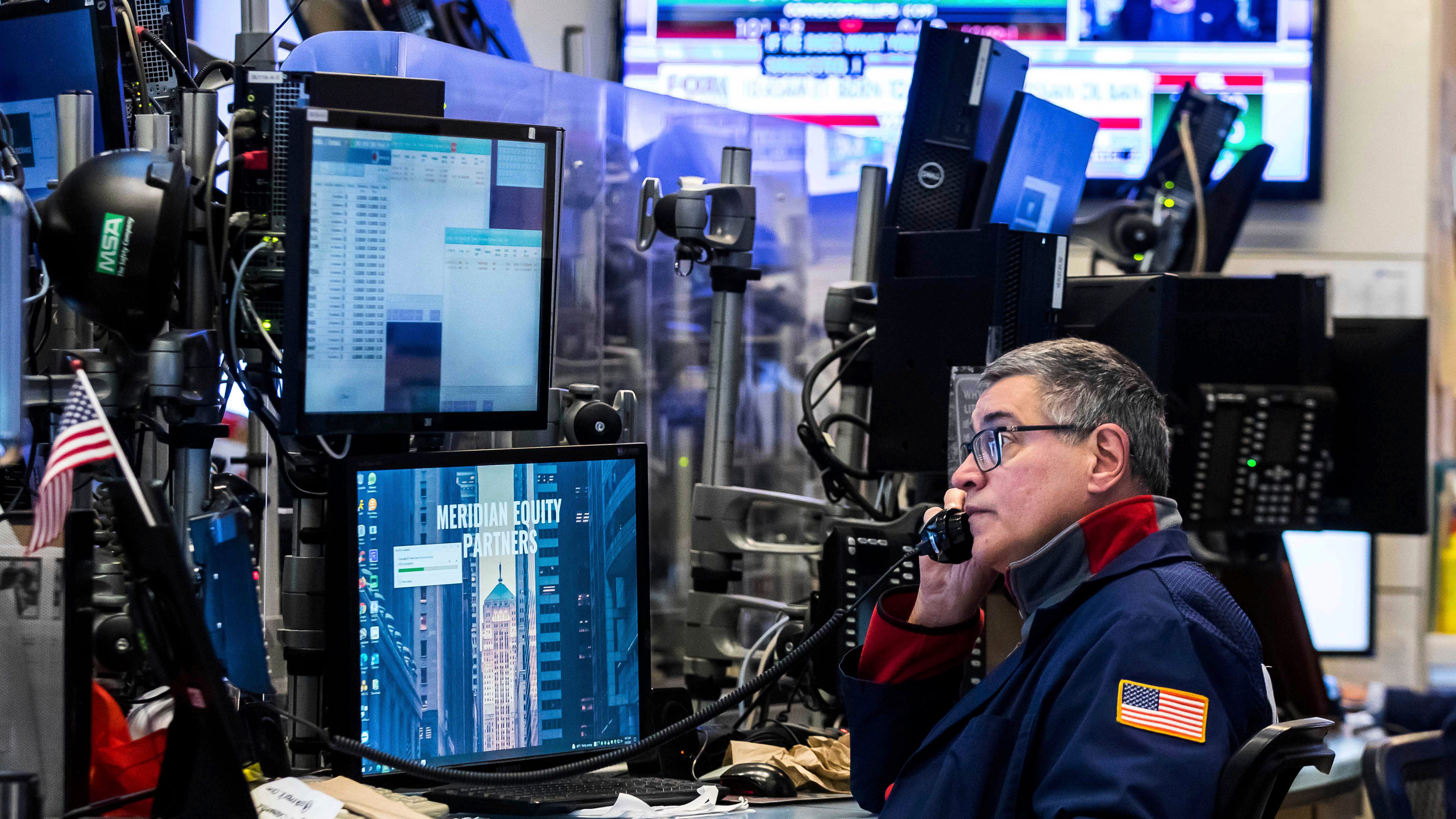 Stocks wobble lower, crude climbs after US bans Russian oil