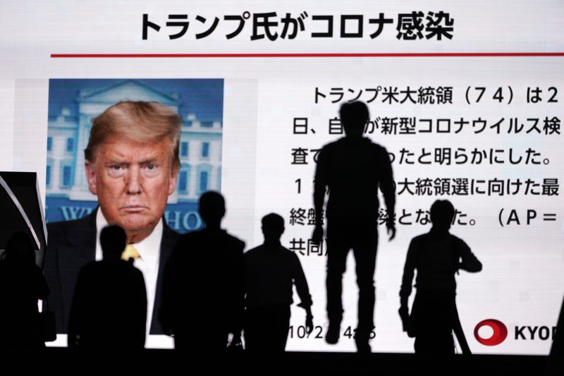 APTOPIX Virus Outbreak Japan Trump Reax
