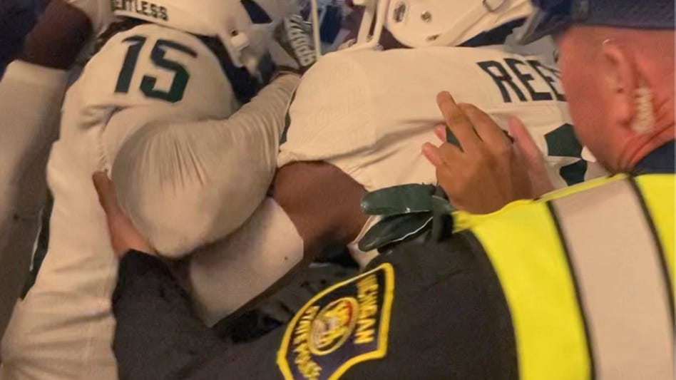 Seven Michigan St football players charged in tunnel melee