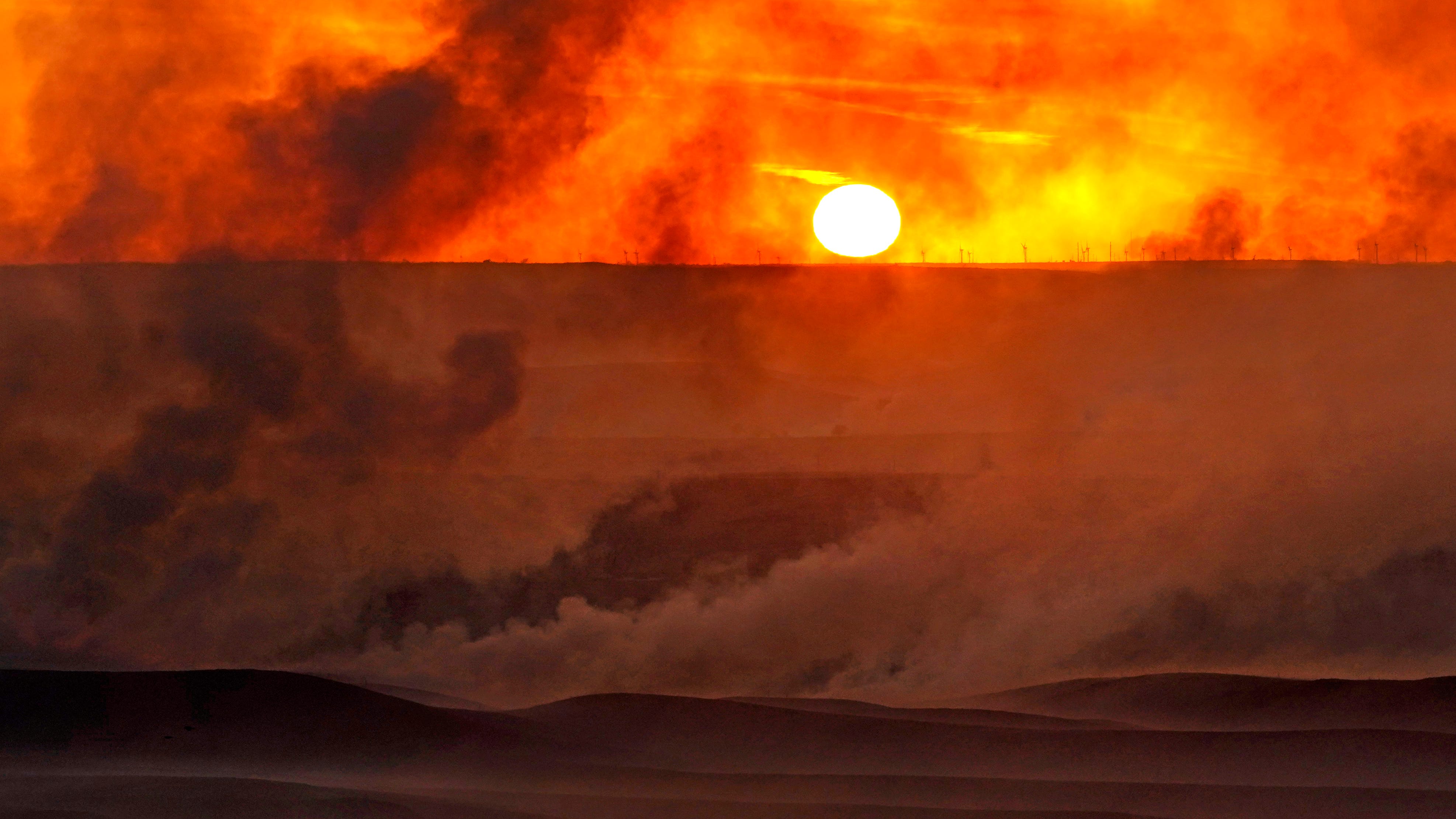 2 dead in Kansas wildfires fueled by windy, dry weather