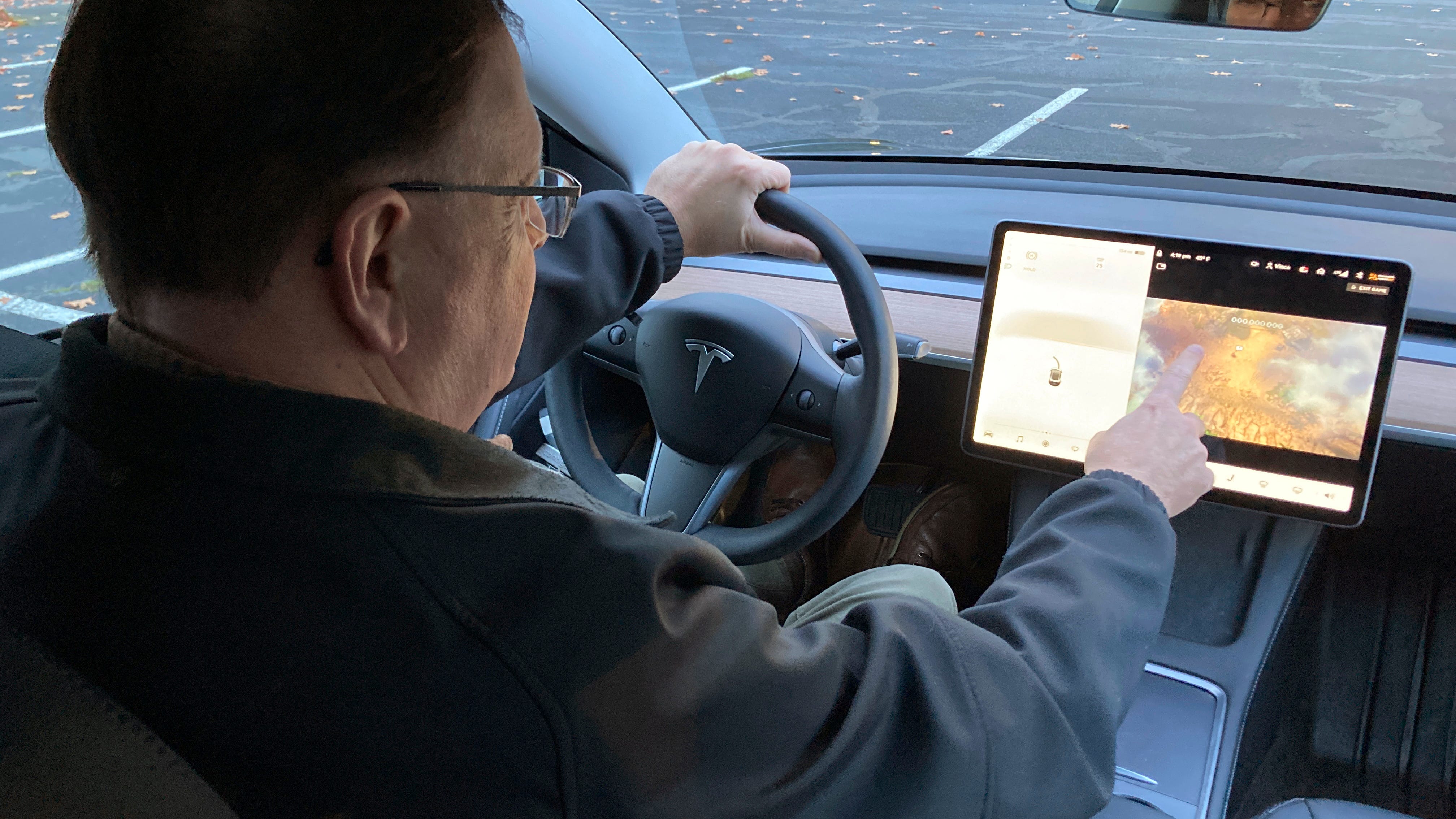 Drivers playing video games? US is looking into Tesla case