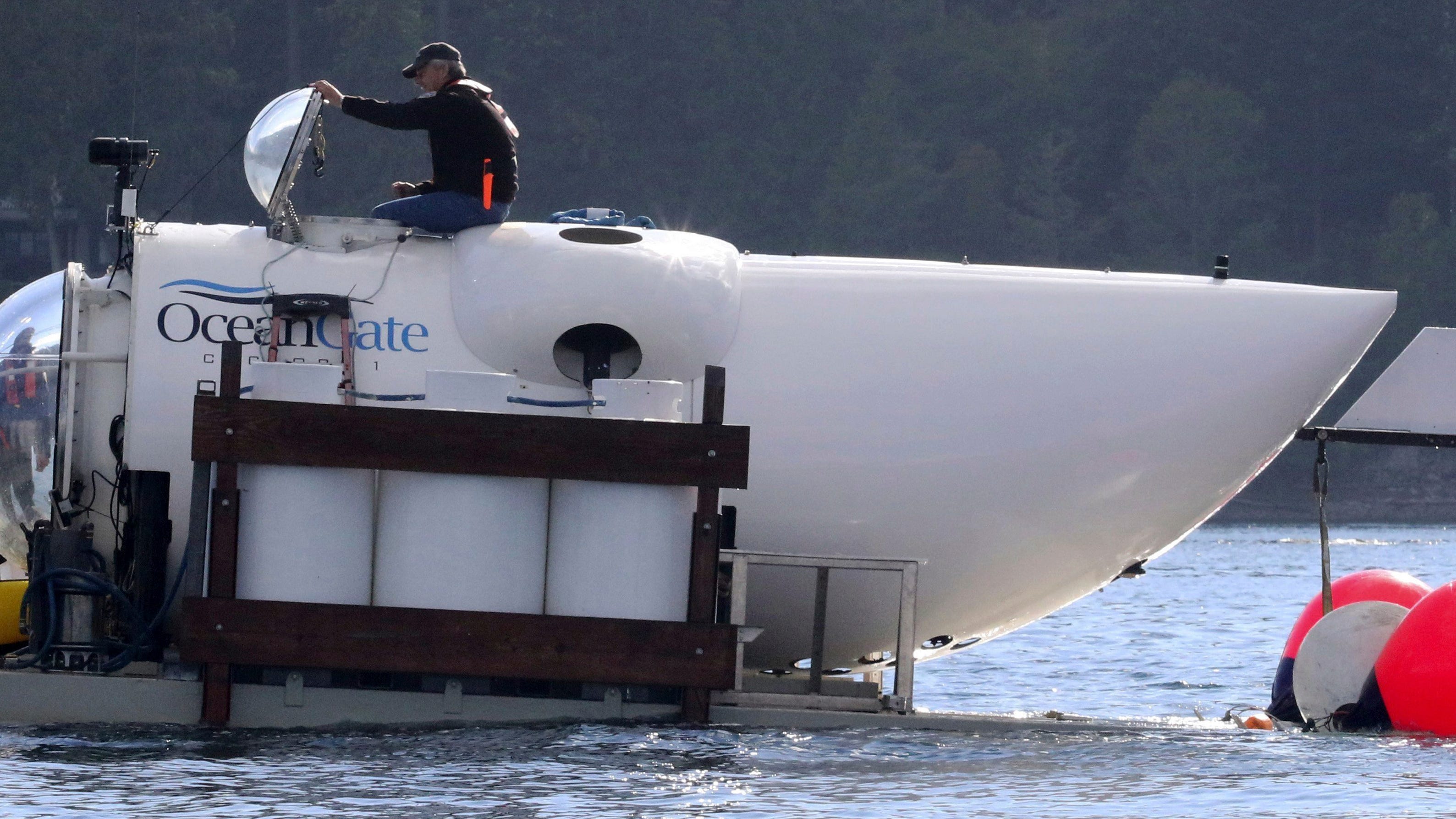 In race against clock, expanding fleet of ships searches for submersible lost near Titanic wreck