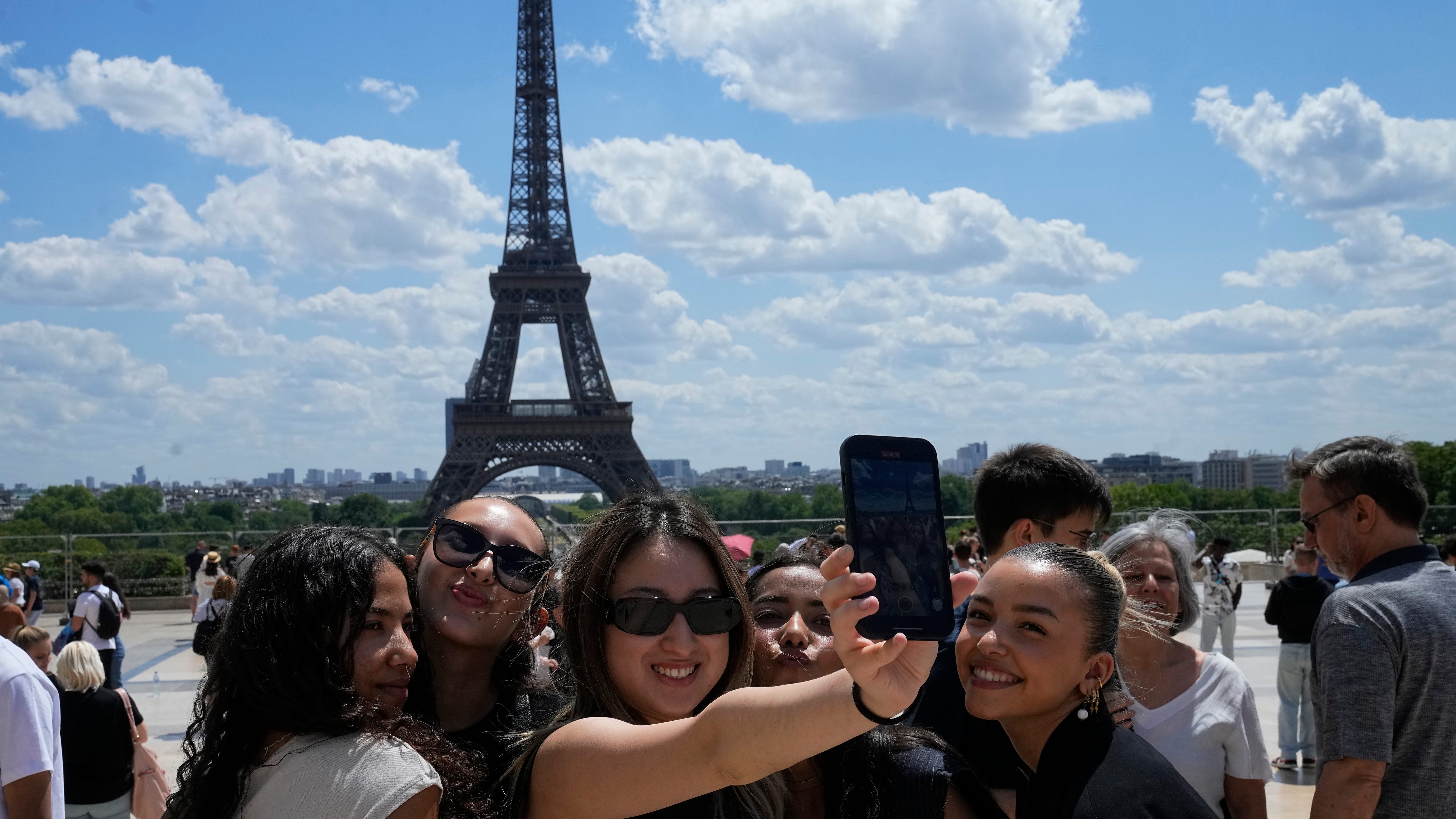 French government paints a rosy picture for tourism despite unrest over the police killing of a teen