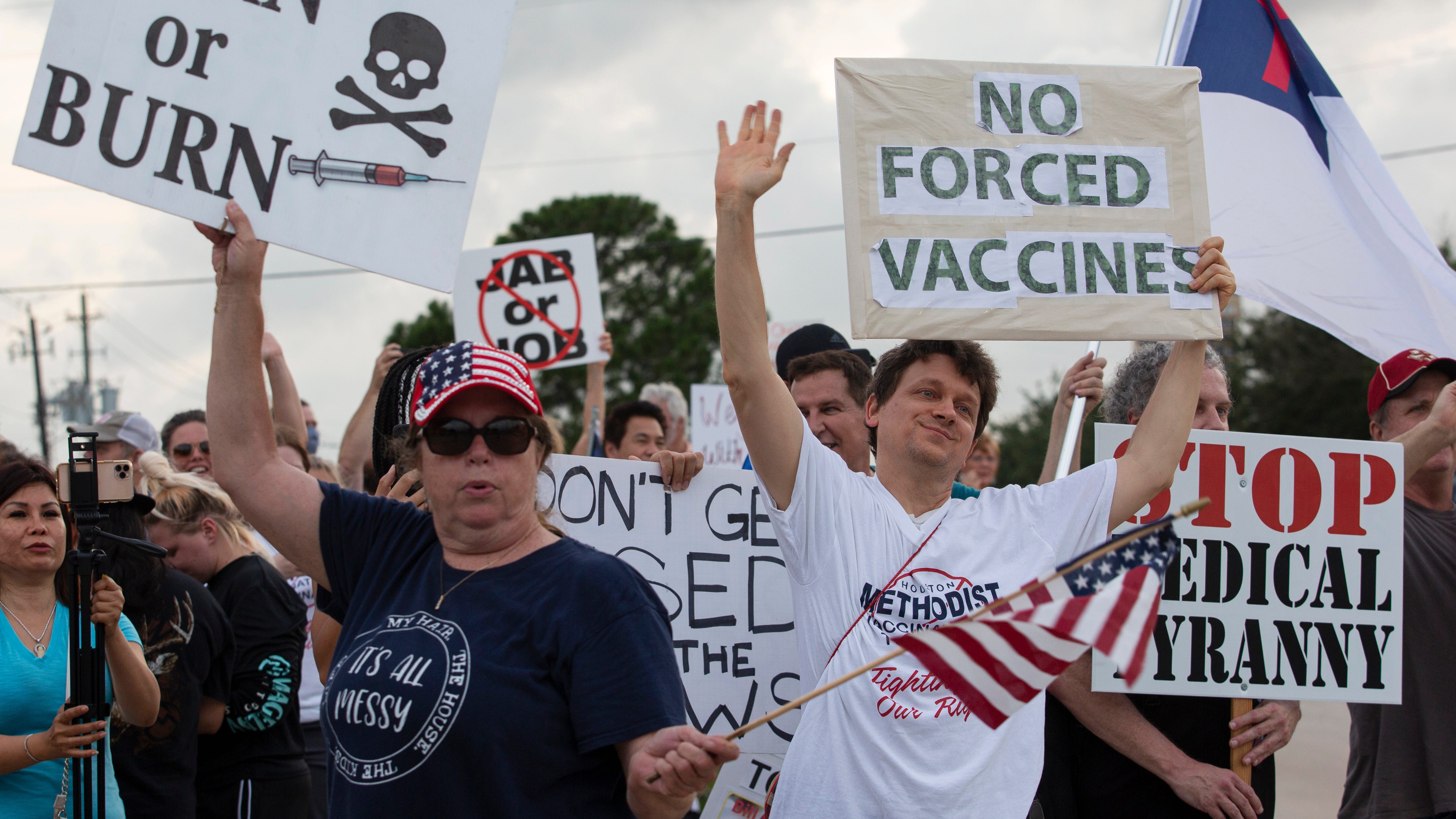 Workers push back against hospitals requiring COVID vaccines
