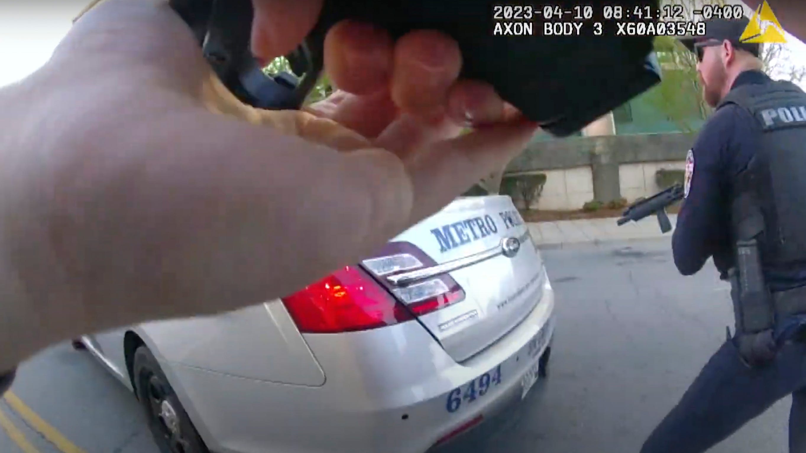 Video shows Louisville police under fire from bank shooter