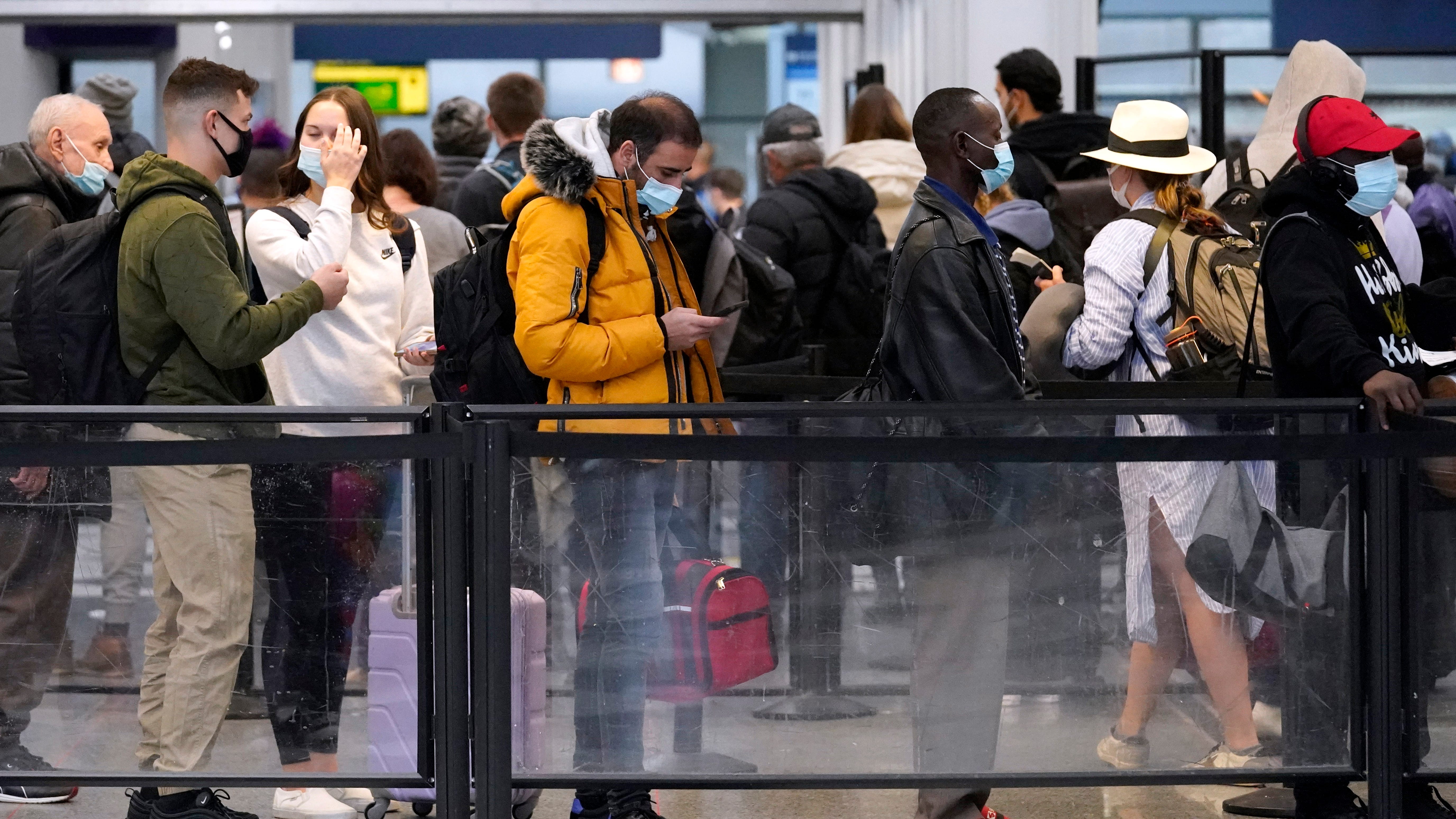 Wave of canceled flights from omicron closes out 2021