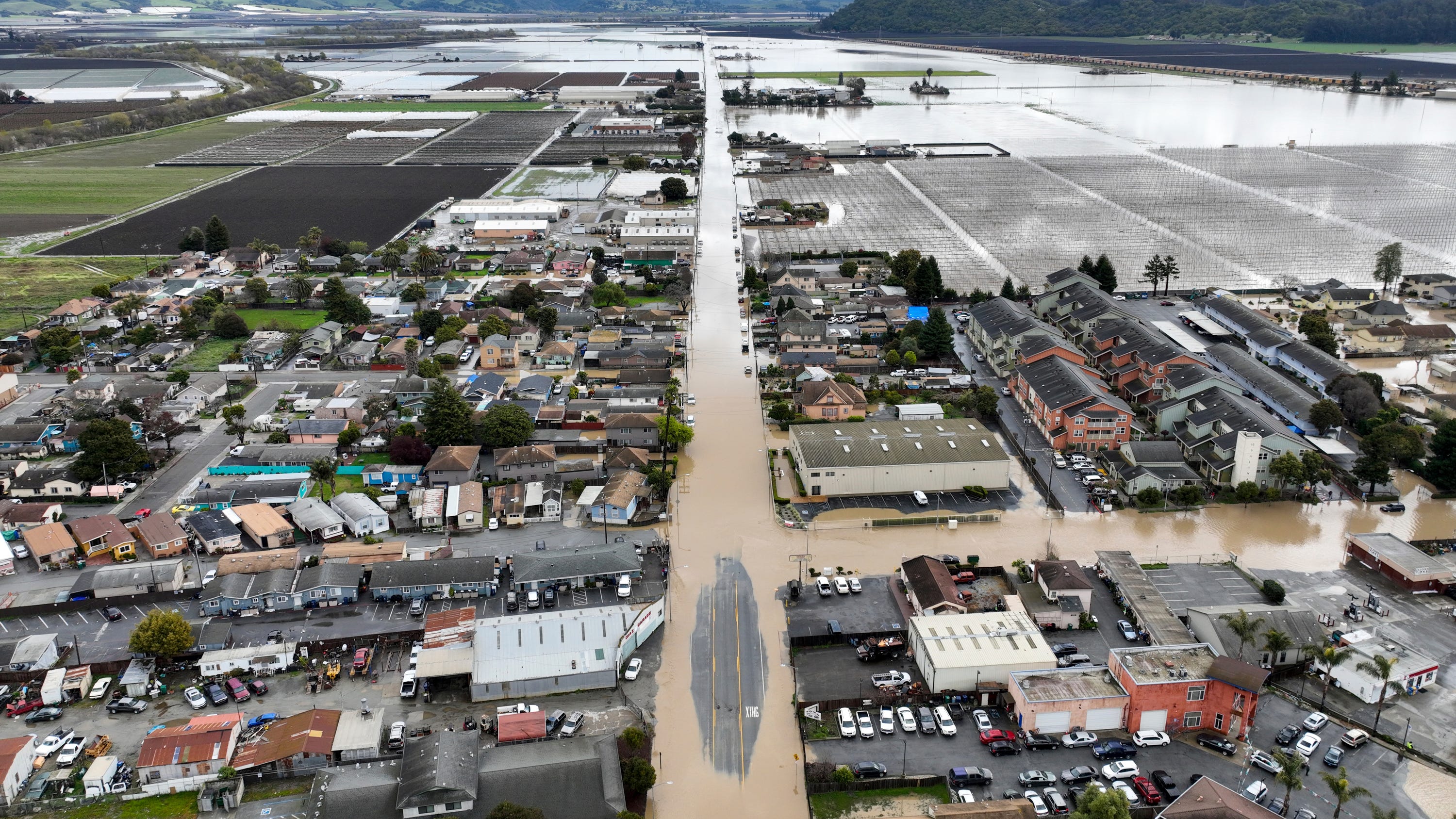 As atmospheric river exits, a new storm threatens California