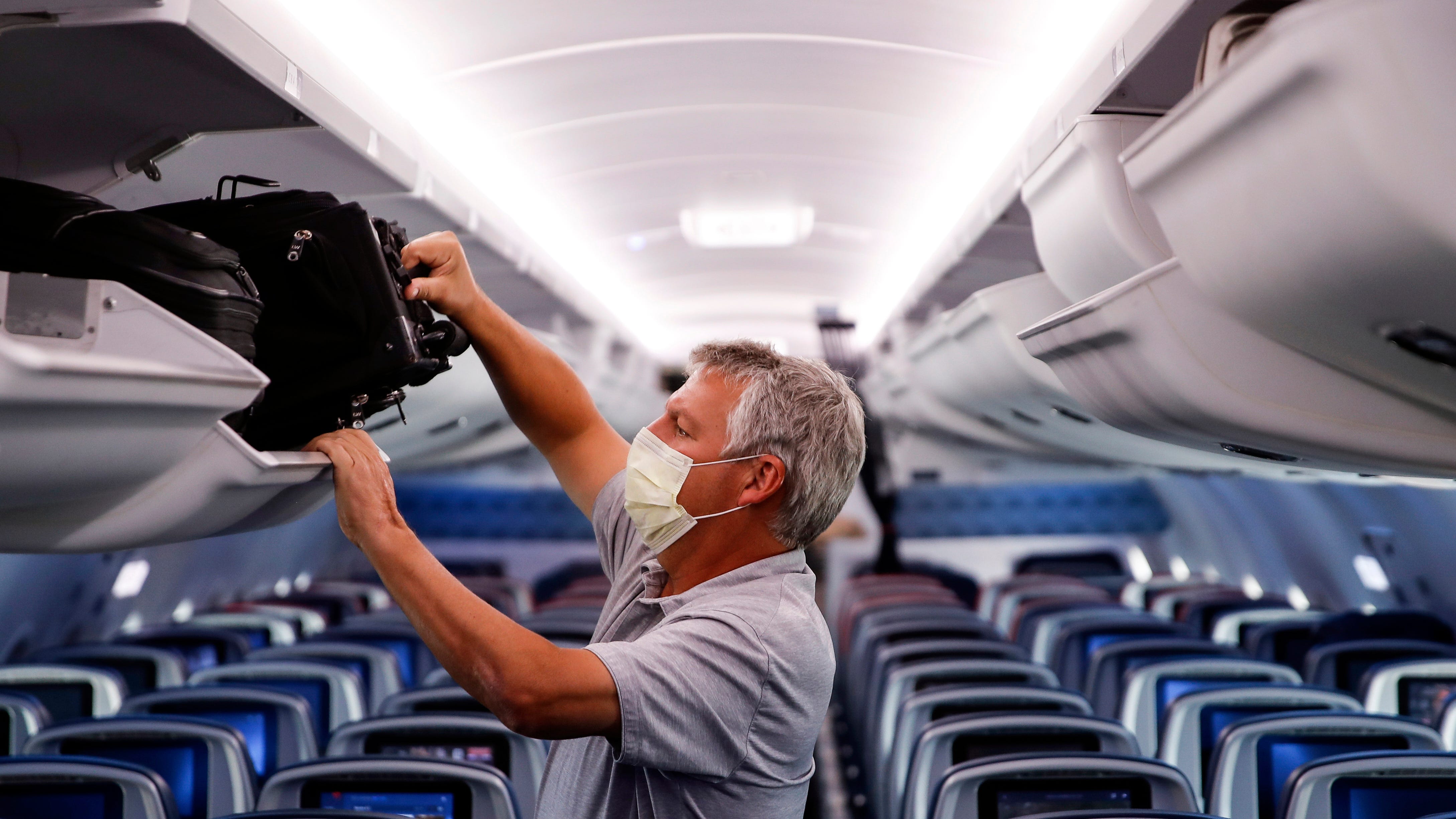 TSA extends into January mask rule for airline passengers