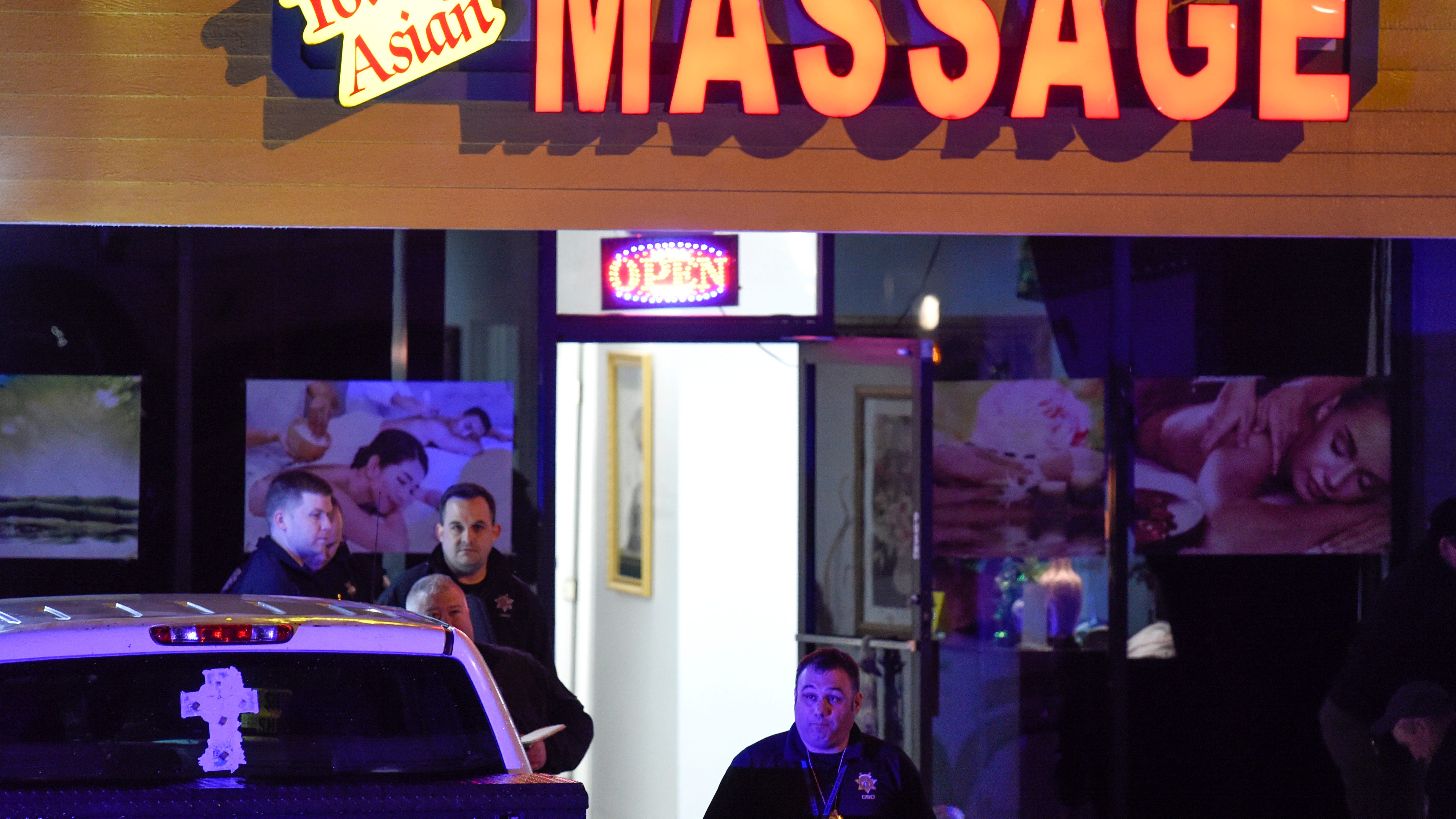 Georgia massage parlor shootings leave 8 dead; man captured
