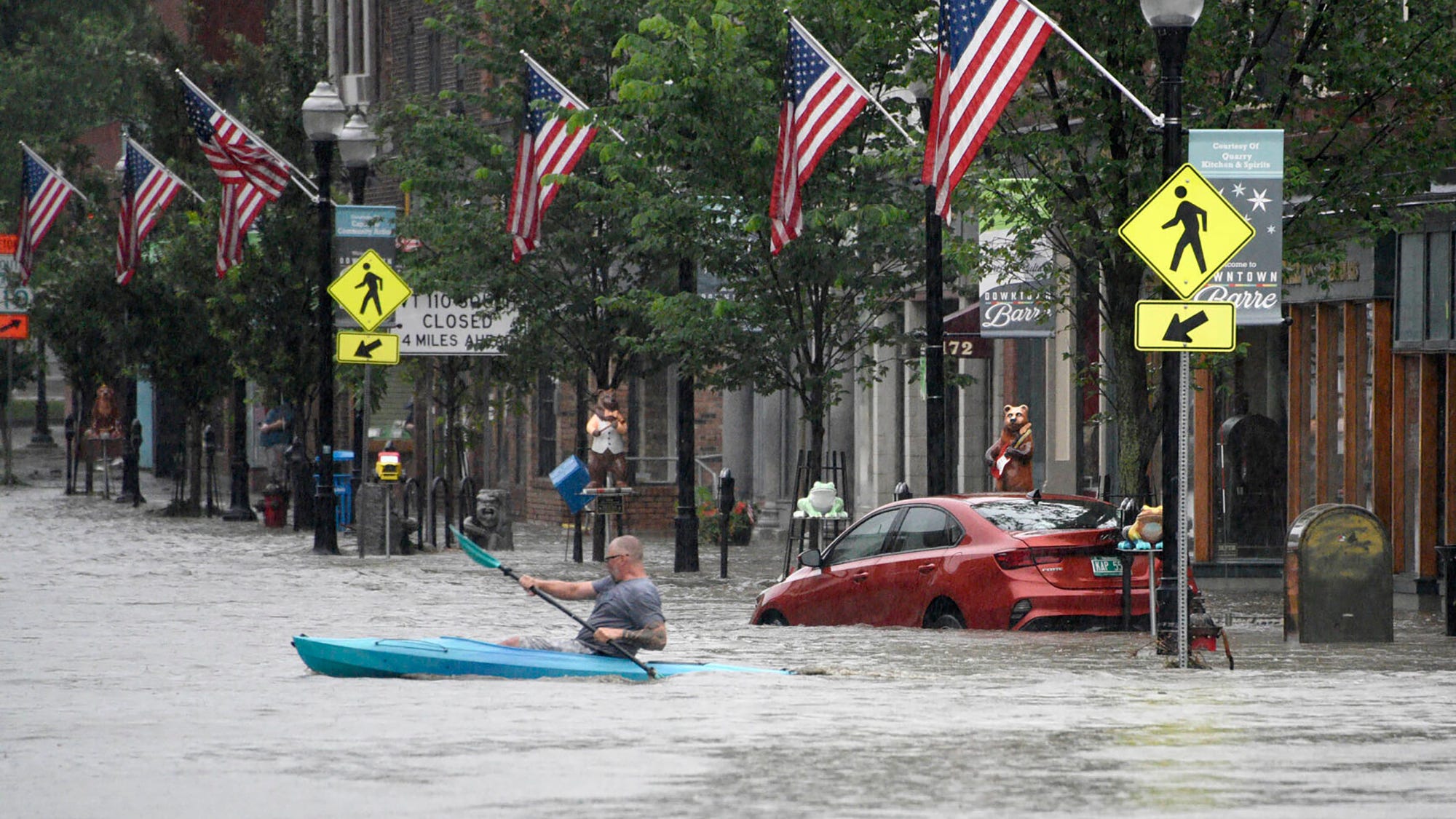 Vermont hit by 2nd day of floods as muddy water reaches the tops of parking meters in capital city