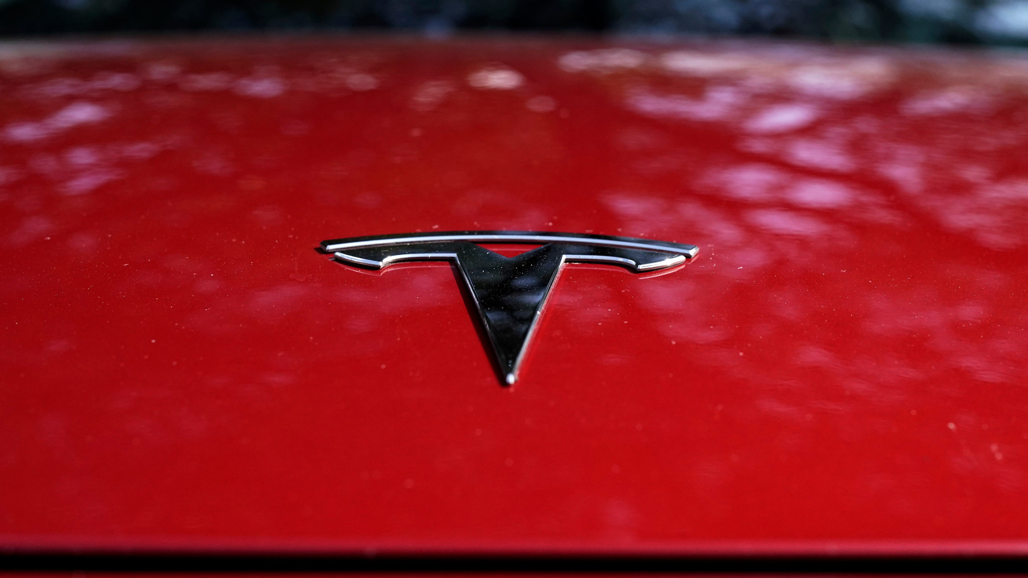 Tesla says it will cut costs of next generation cars in half