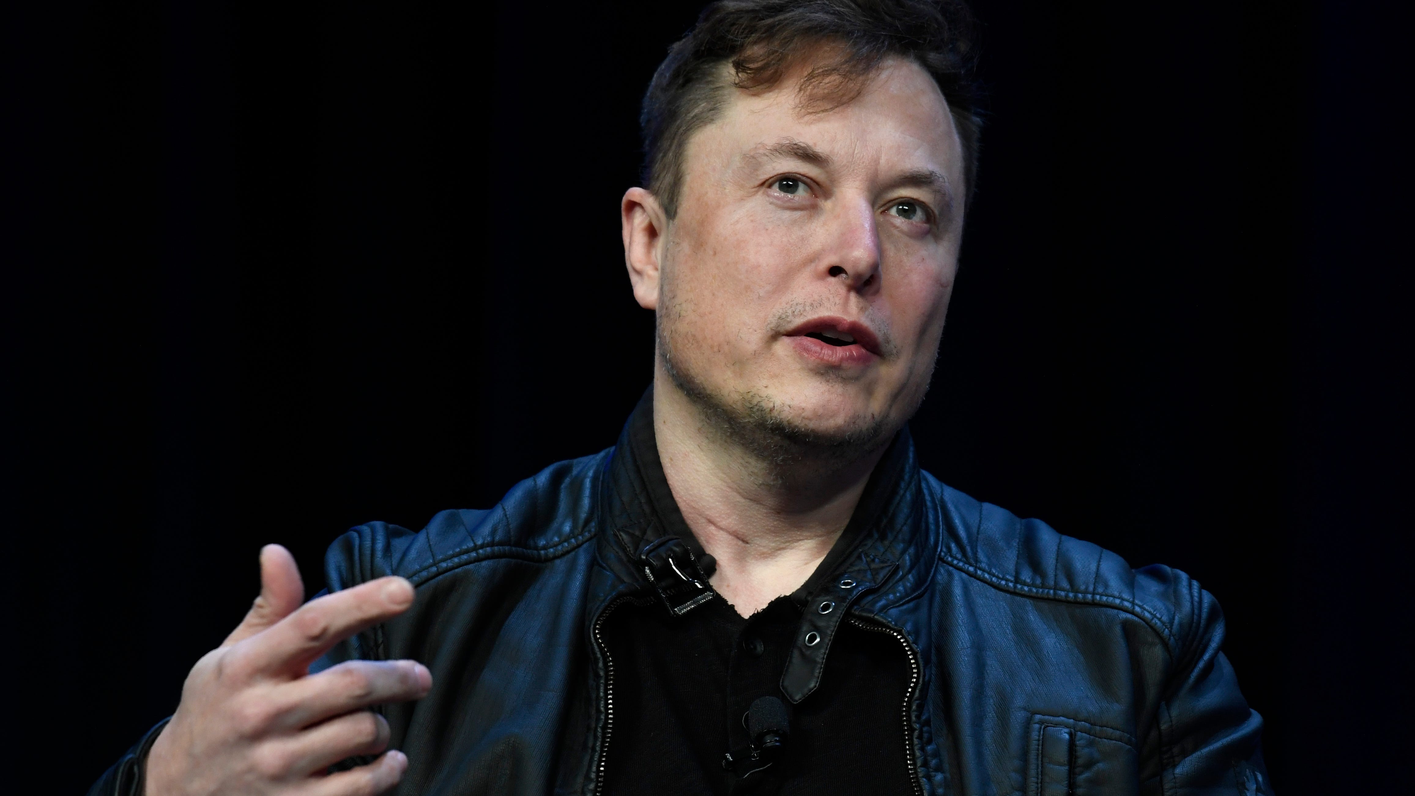 Investors mock Elon Musk's bid to move Tesla buyout trial