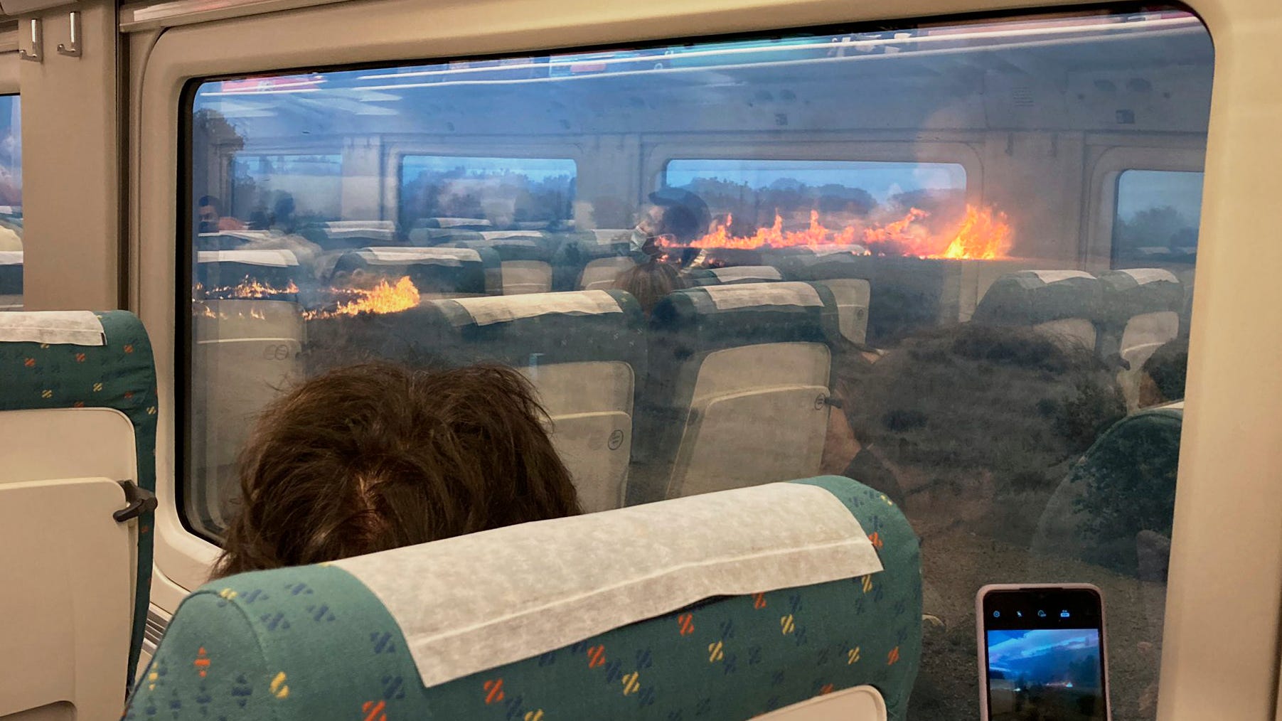 Help! Spaniards spooked when their train stops in wildfire