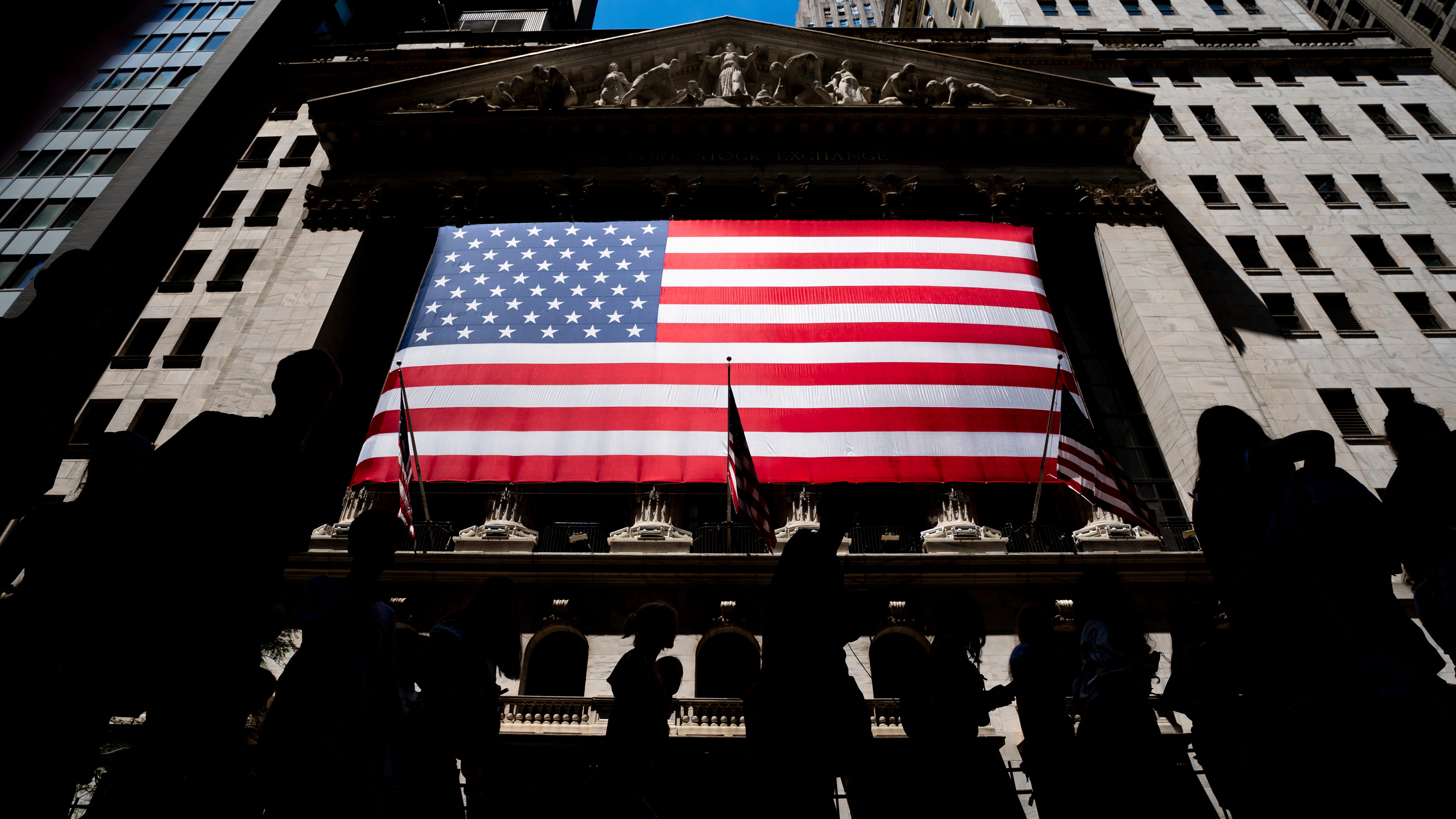 US indexes shake off an early slump and eke out gains