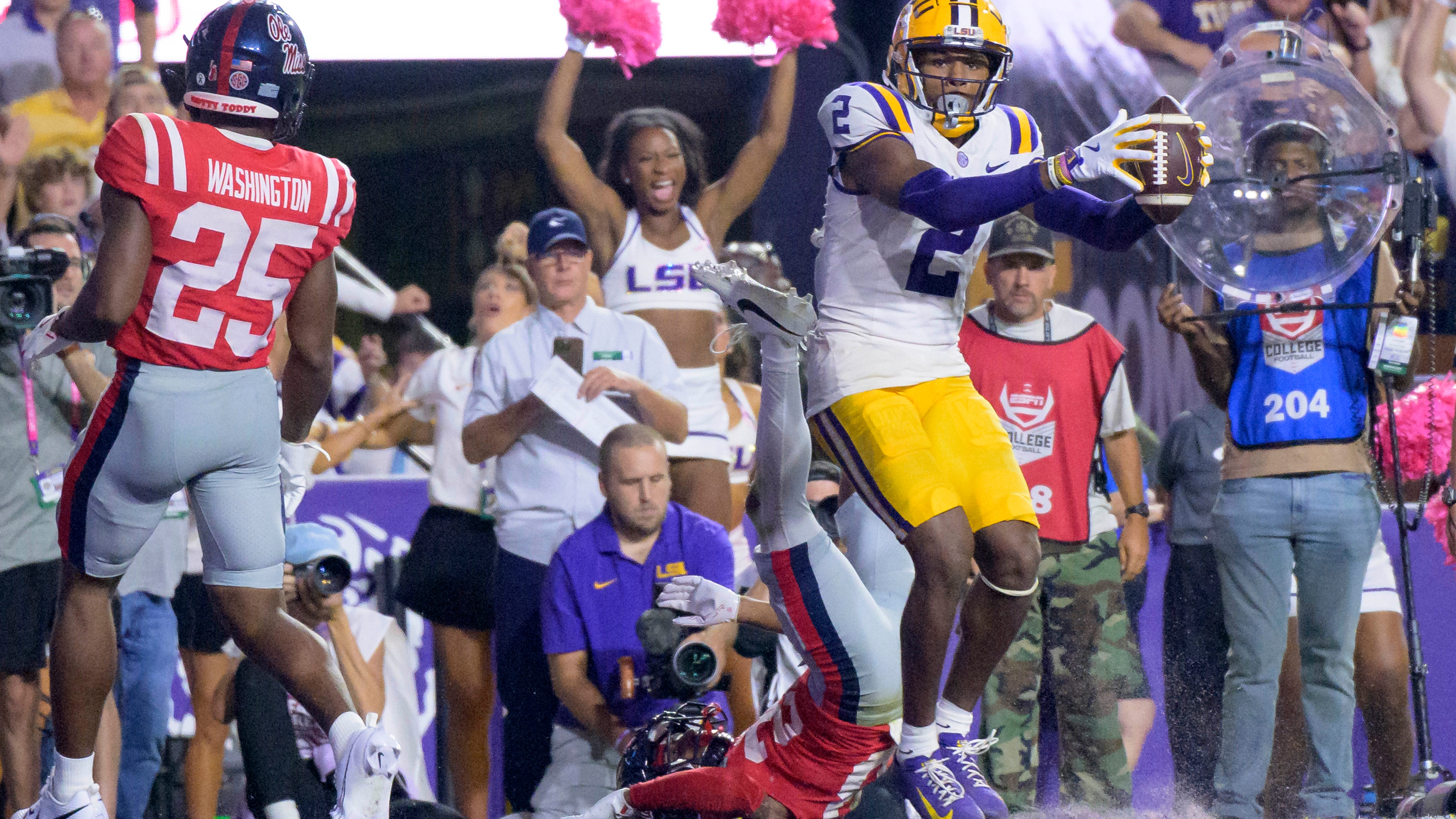Nussmeier throws late TD passes, No. 13 LSU rallies to beat No. 9 Ole Miss 29-26 in overtime