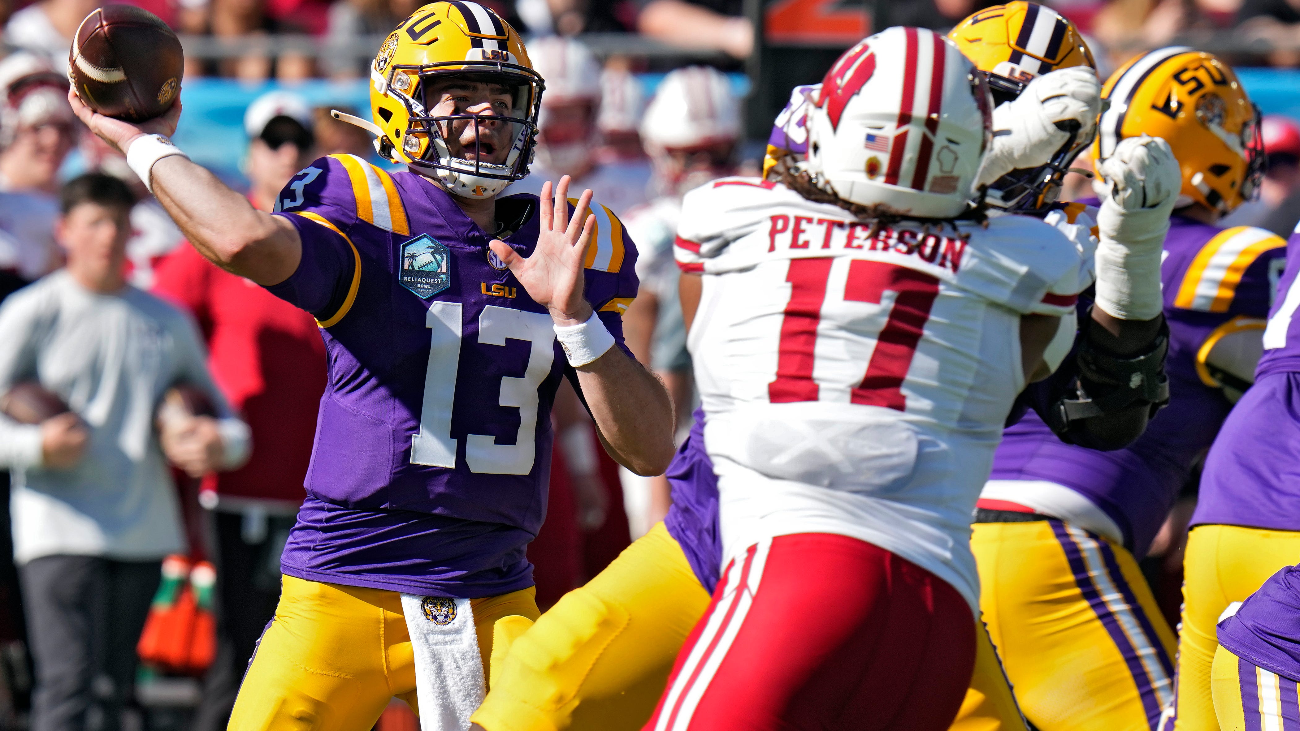 Nussmeier shines as Daniels' successor, No. 13 LSU rallies to nip Wisconsin 35-31 in ReliaQuest Bowl