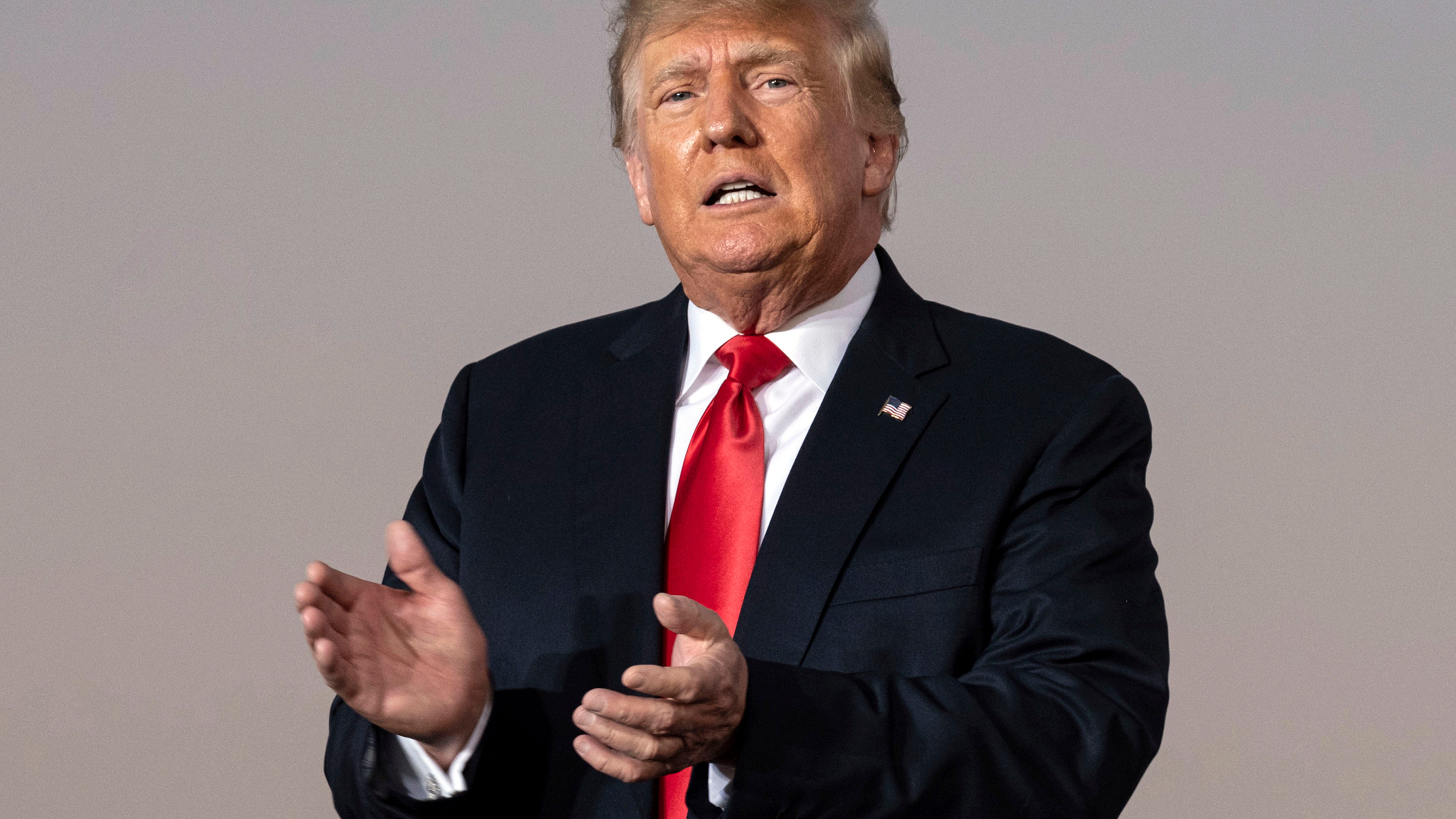 Supporters of Georgia's Kemp counterattack after Trump rally
